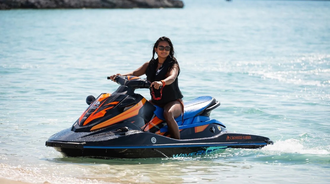 a person in a kayak aboard CROSSED SABRE Yacht for Charter