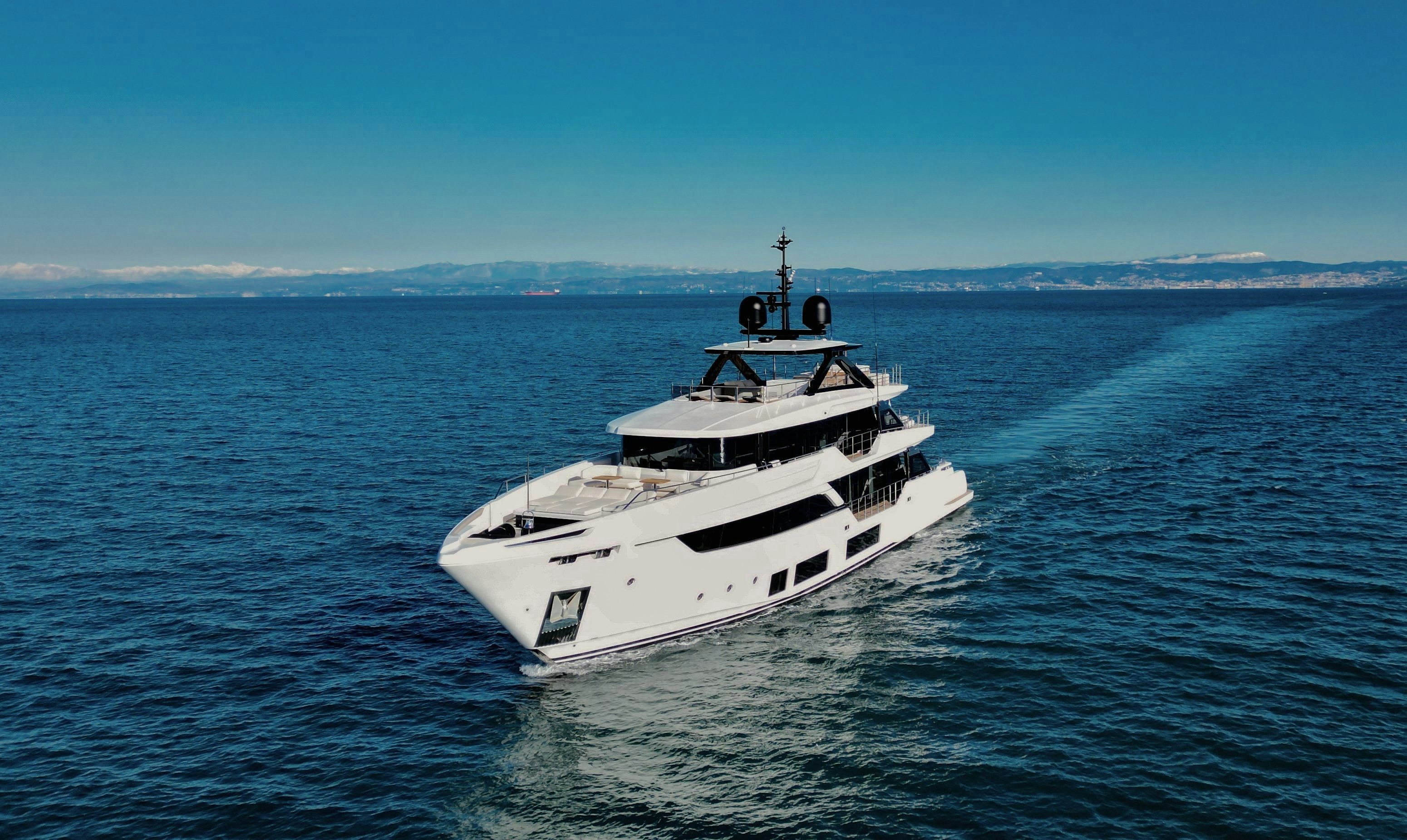 a white yacht in the water aboard LA VETTA Yacht for Sale