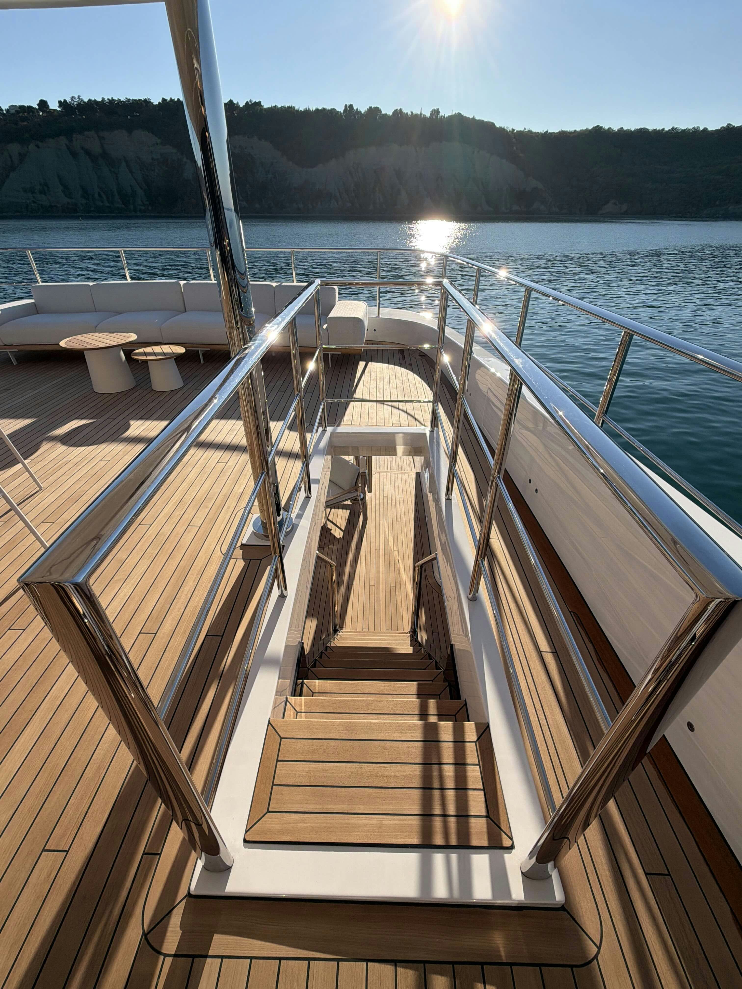 a wooden bridge over water aboard LA VETTA Yacht for Sale