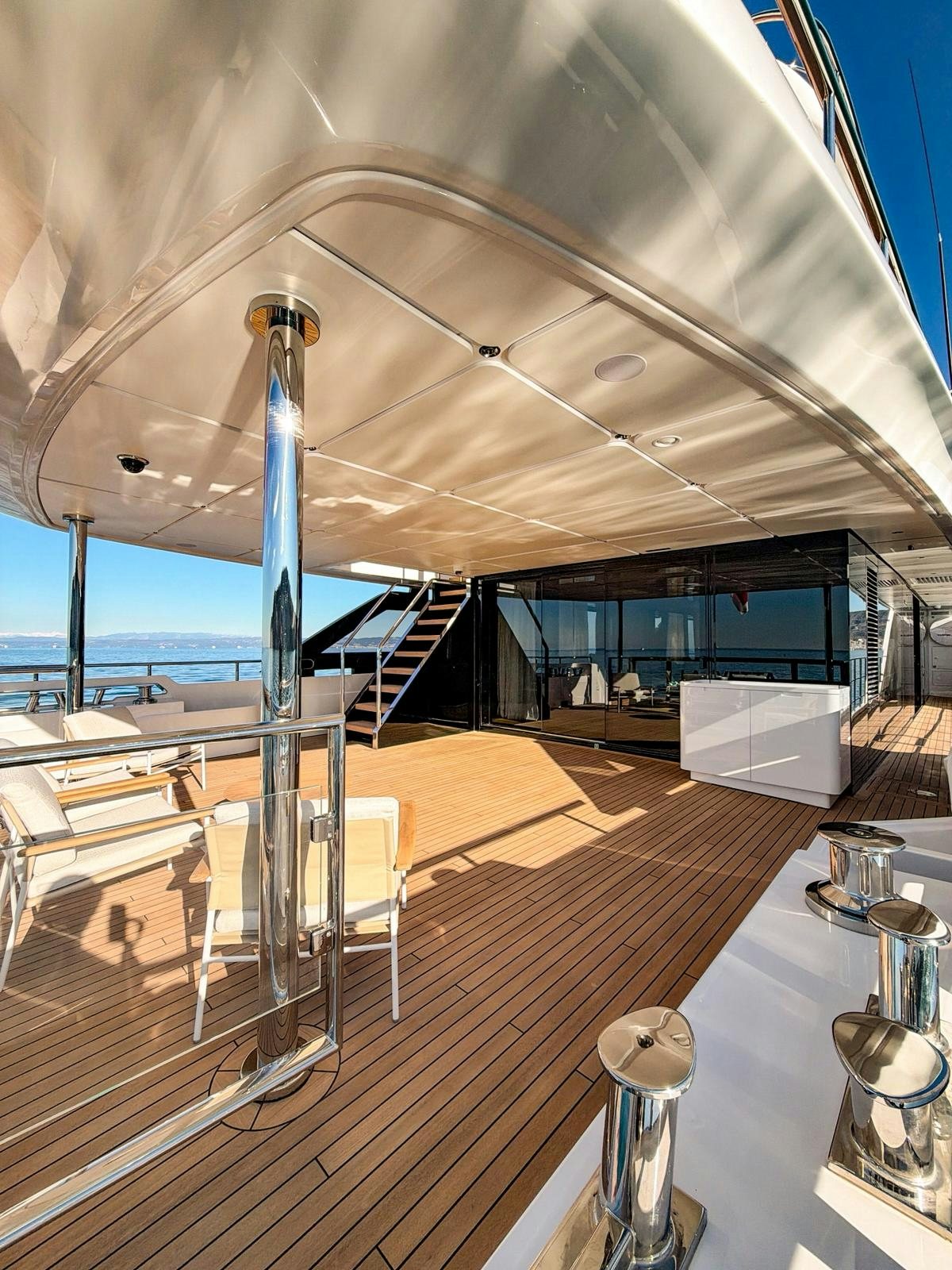 a large boat on a deck aboard LA VETTA Yacht for Sale