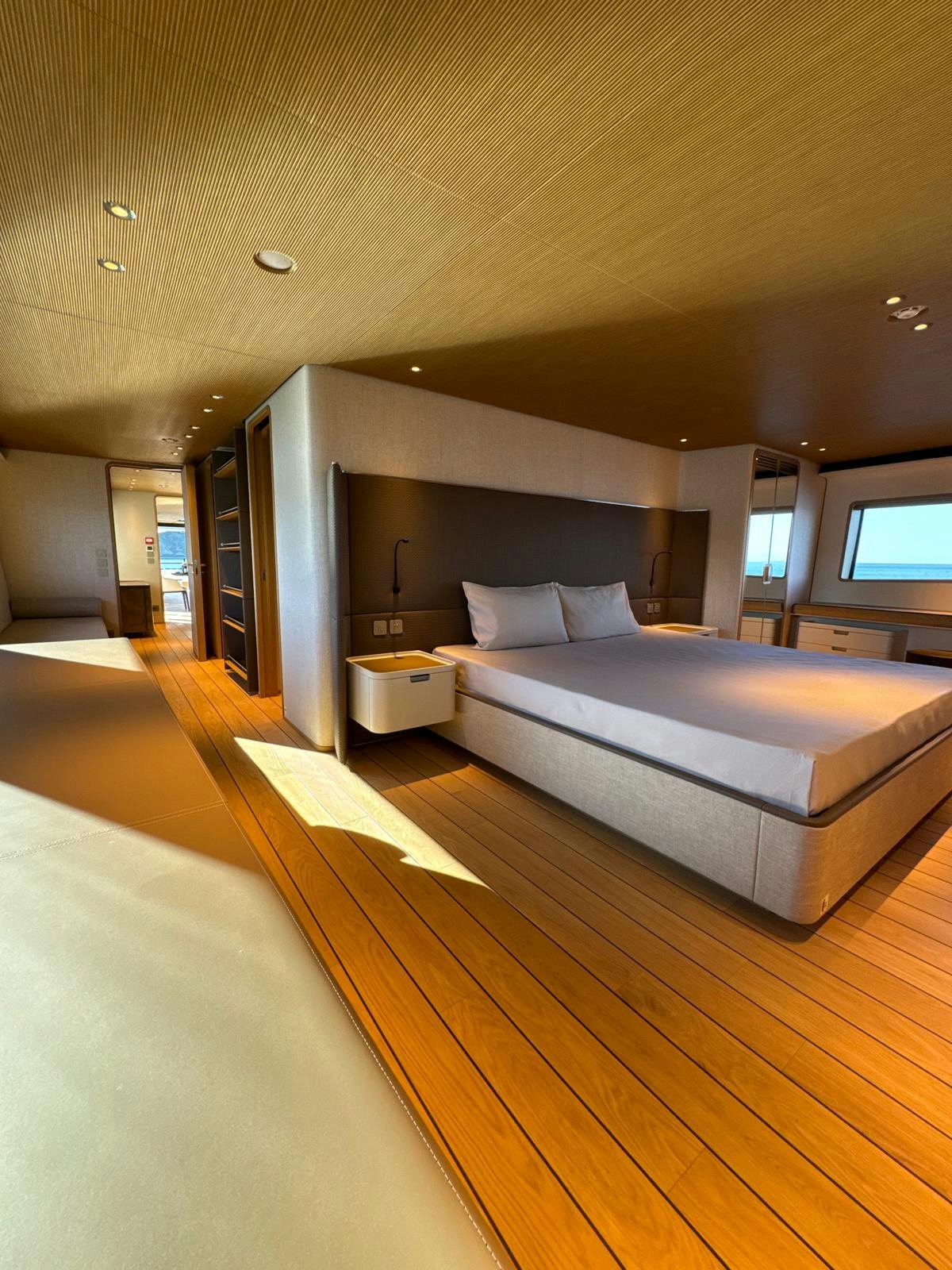 a large bedroom with a large bed aboard LA VETTA Yacht for Sale