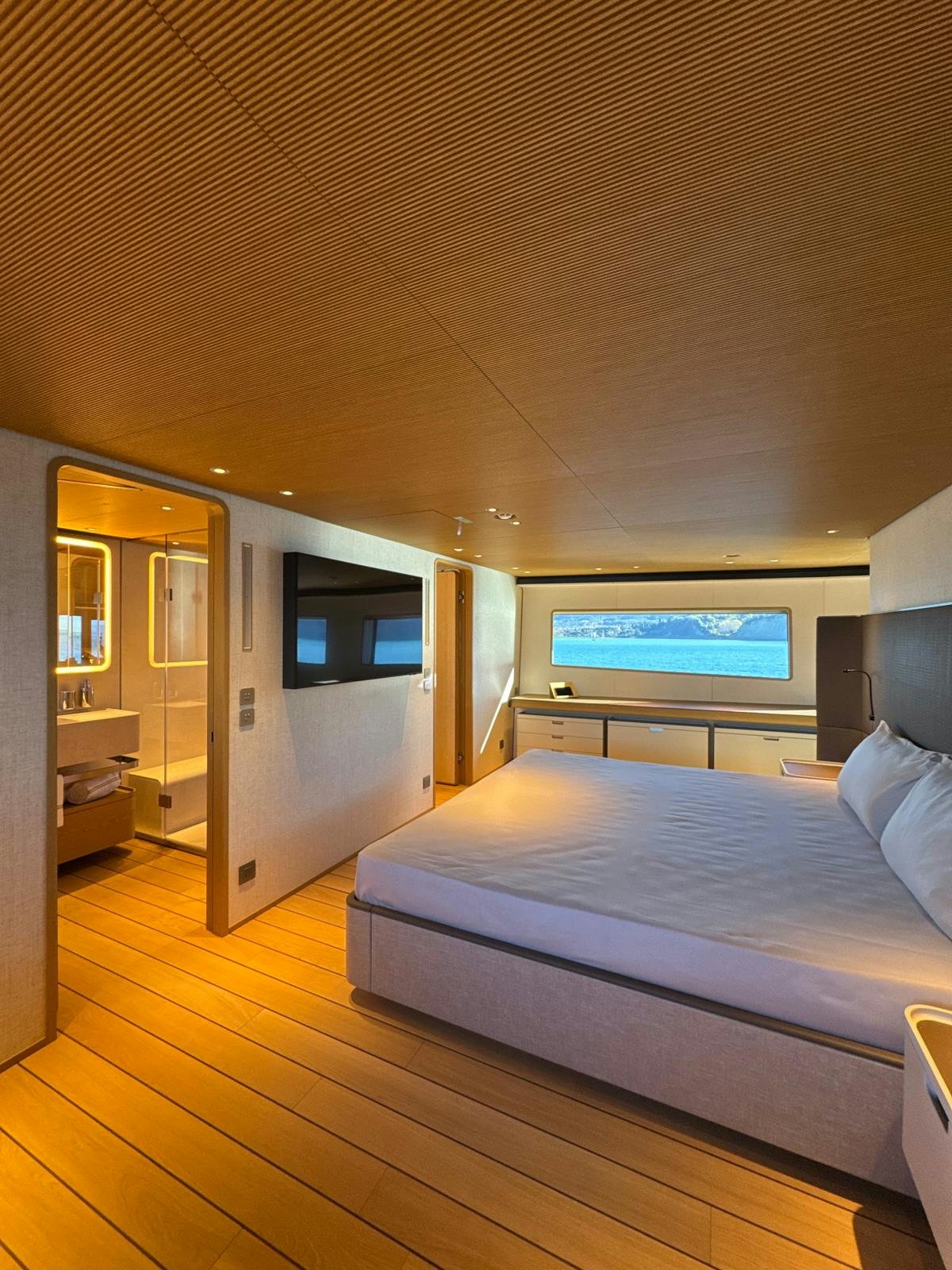 a bed in a room aboard LA VETTA Yacht for Sale