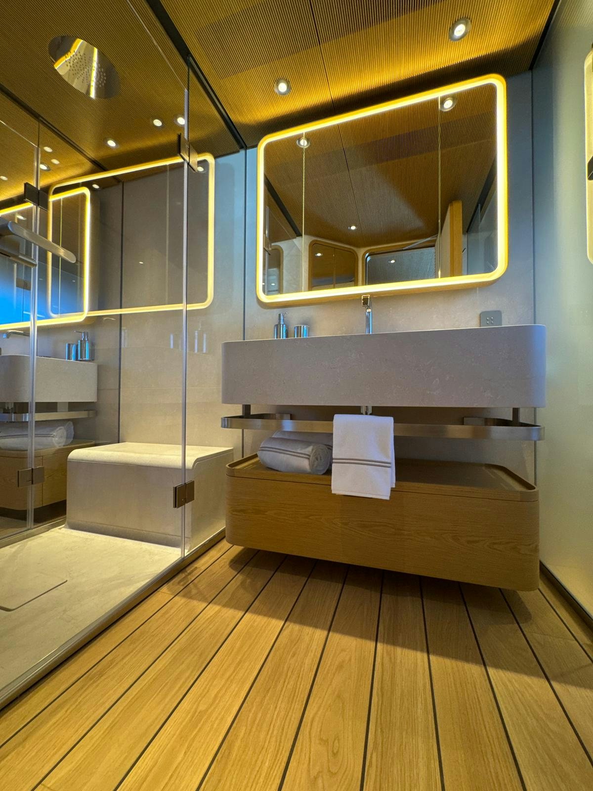 a bathroom with a large mirror aboard LA VETTA Yacht for Sale