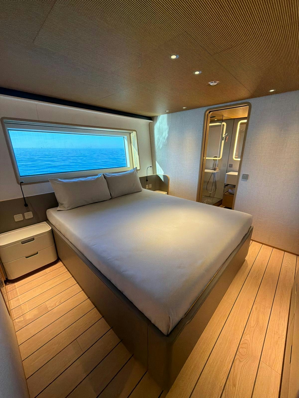 a bed in a room aboard LA VETTA Yacht for Sale