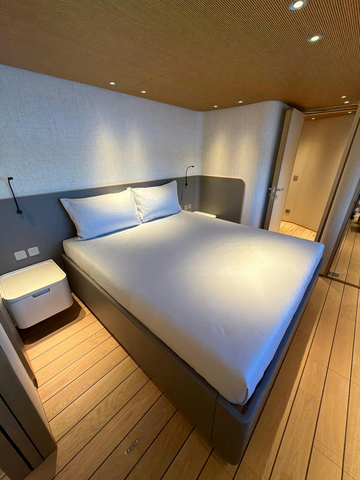 a bed in a room aboard LA VETTA Yacht for Sale