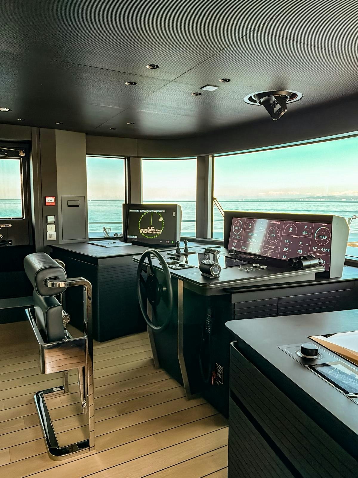 a room with a desk and computer aboard LA VETTA Yacht for Sale