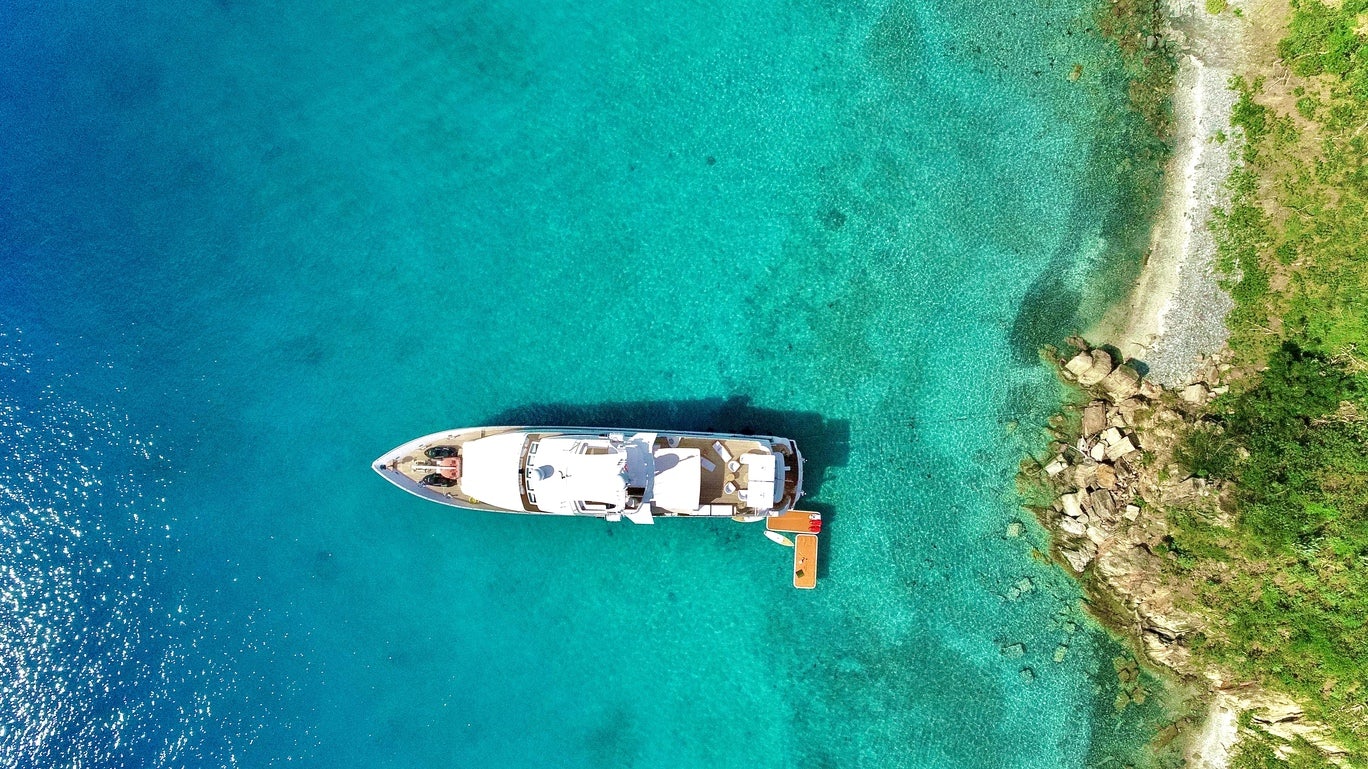 a white boat in the water aboard KARTAL YUVASI Yacht for Charter