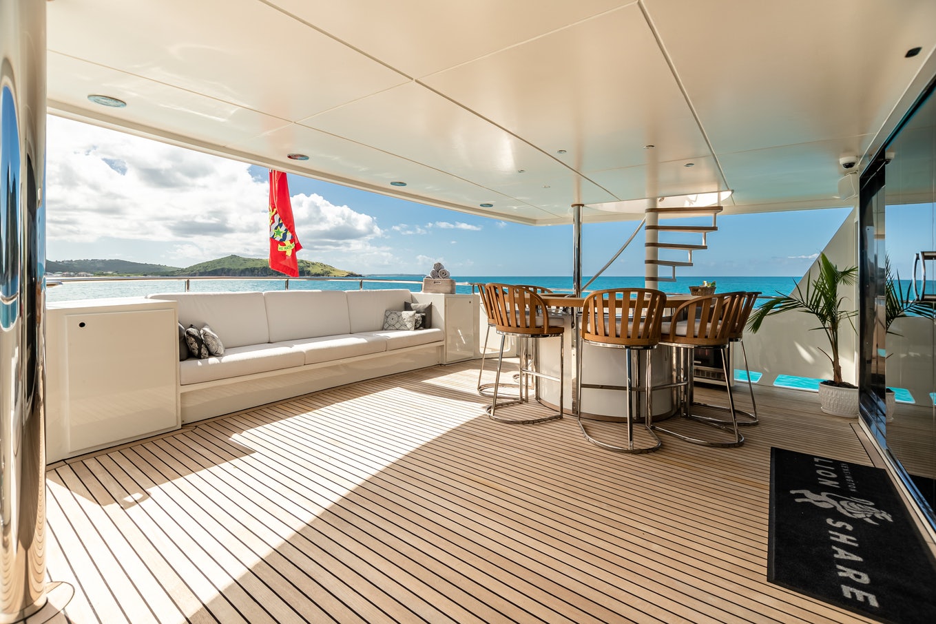 a room with a couch and a table and chairs aboard KARTAL YUVASI Yacht for Charter