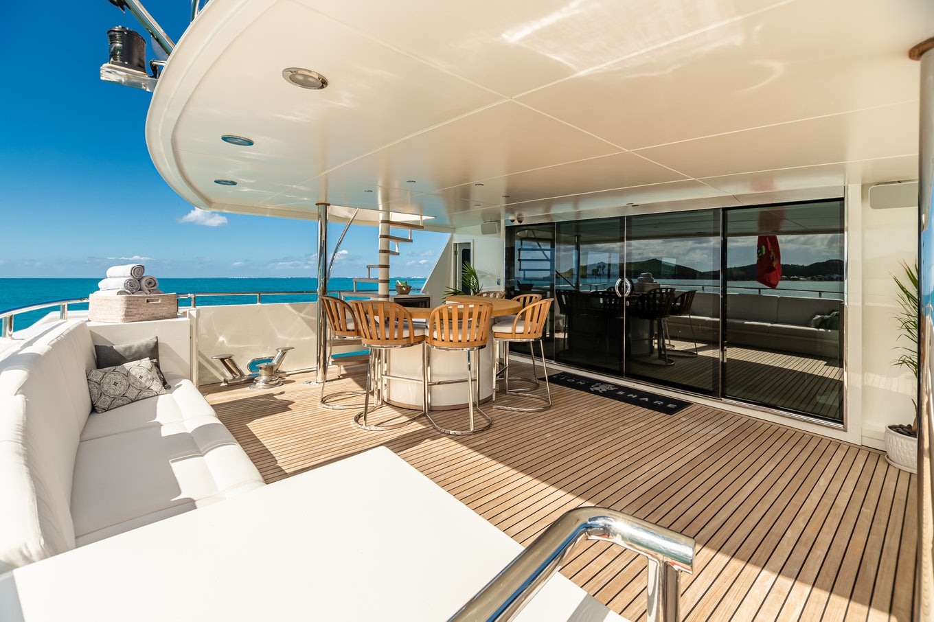 a room with a couch and a table and chairs aboard KARTAL YUVASI Yacht for Charter