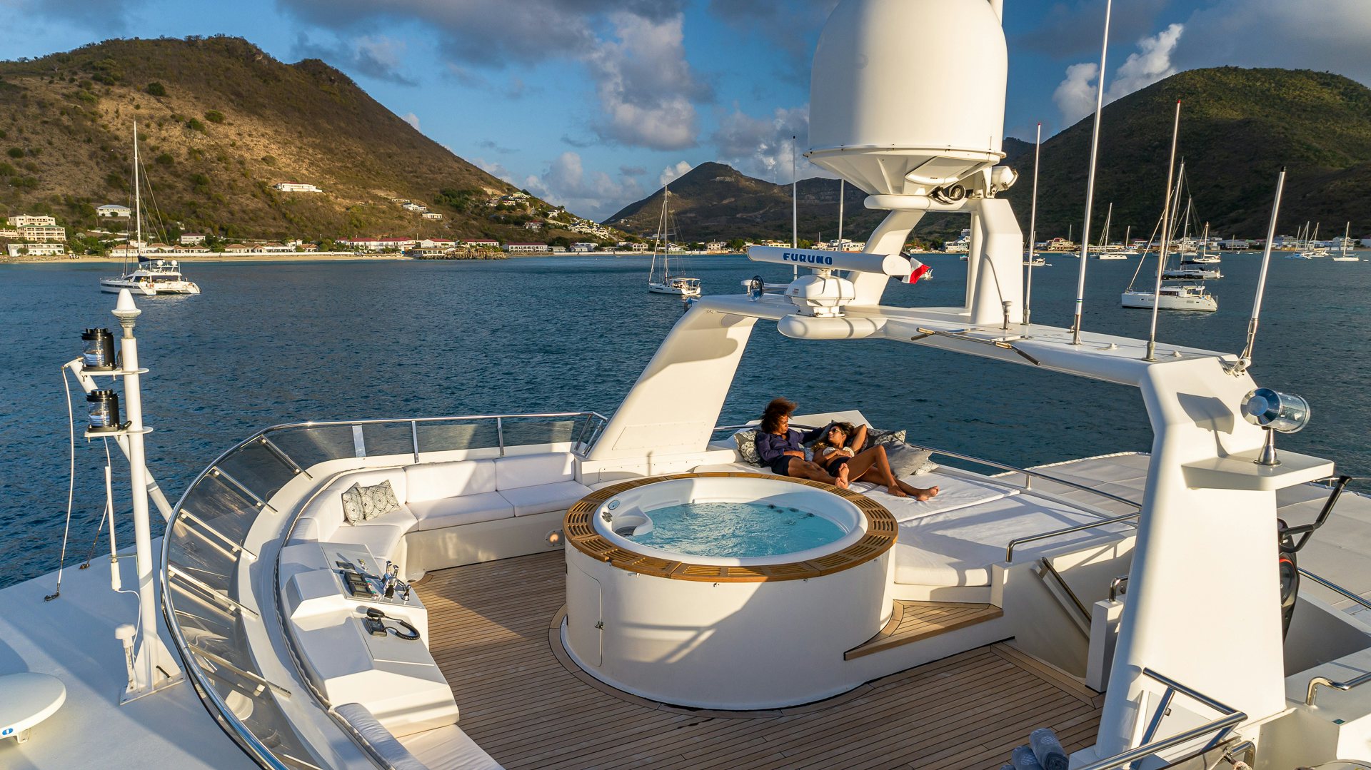 a man and a woman on a boat in the water aboard KARTAL YUVASI Yacht for Charter