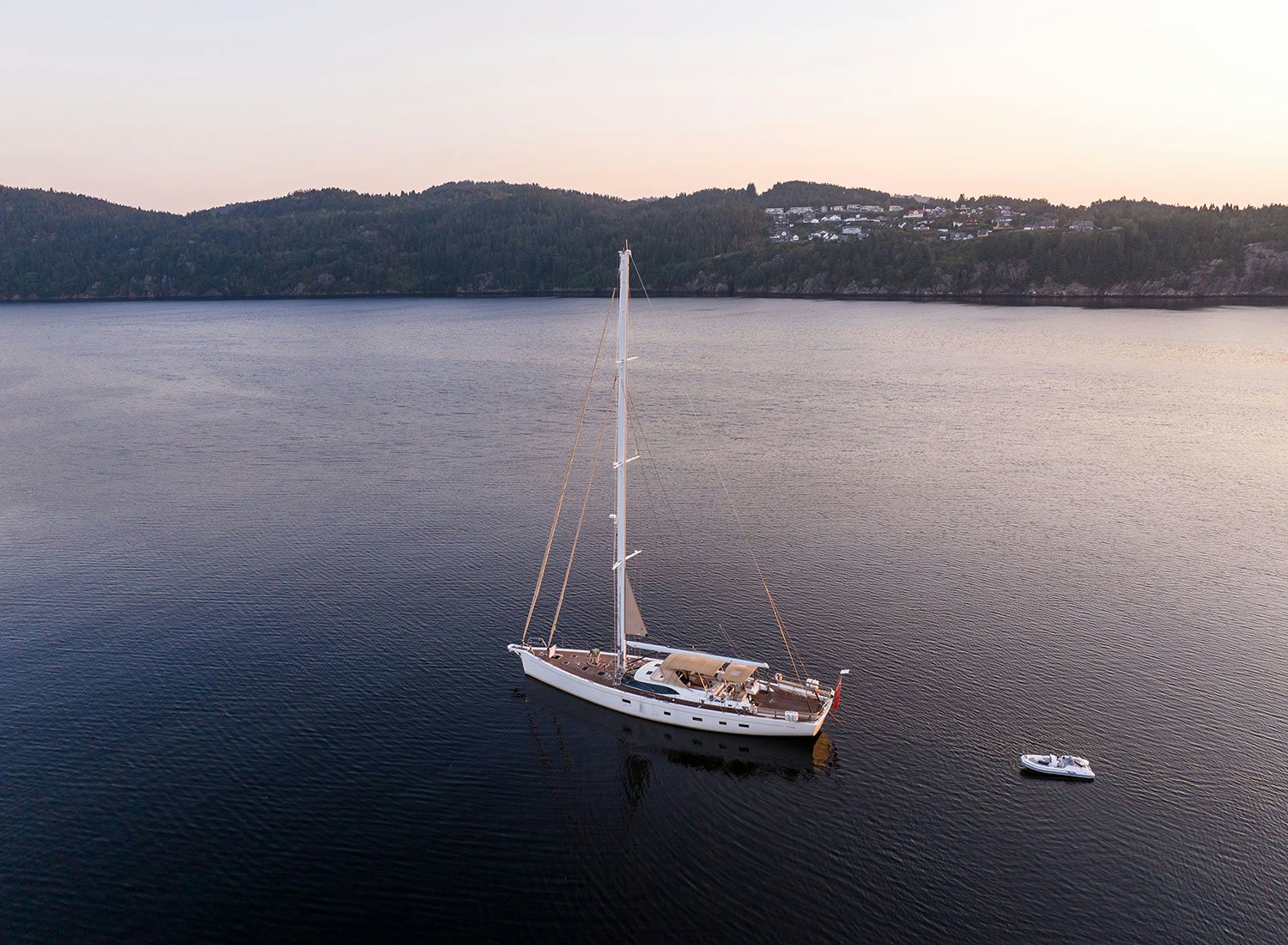 a boat sailing on the water aboard CHAMPAGNE HIPPY Yacht for Sale