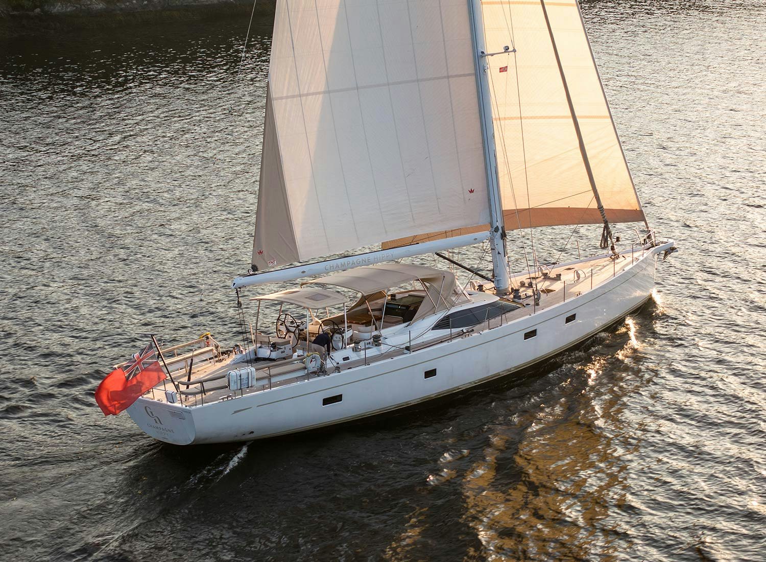 a sailboat on the water aboard CHAMPAGNE HIPPY Yacht for Sale