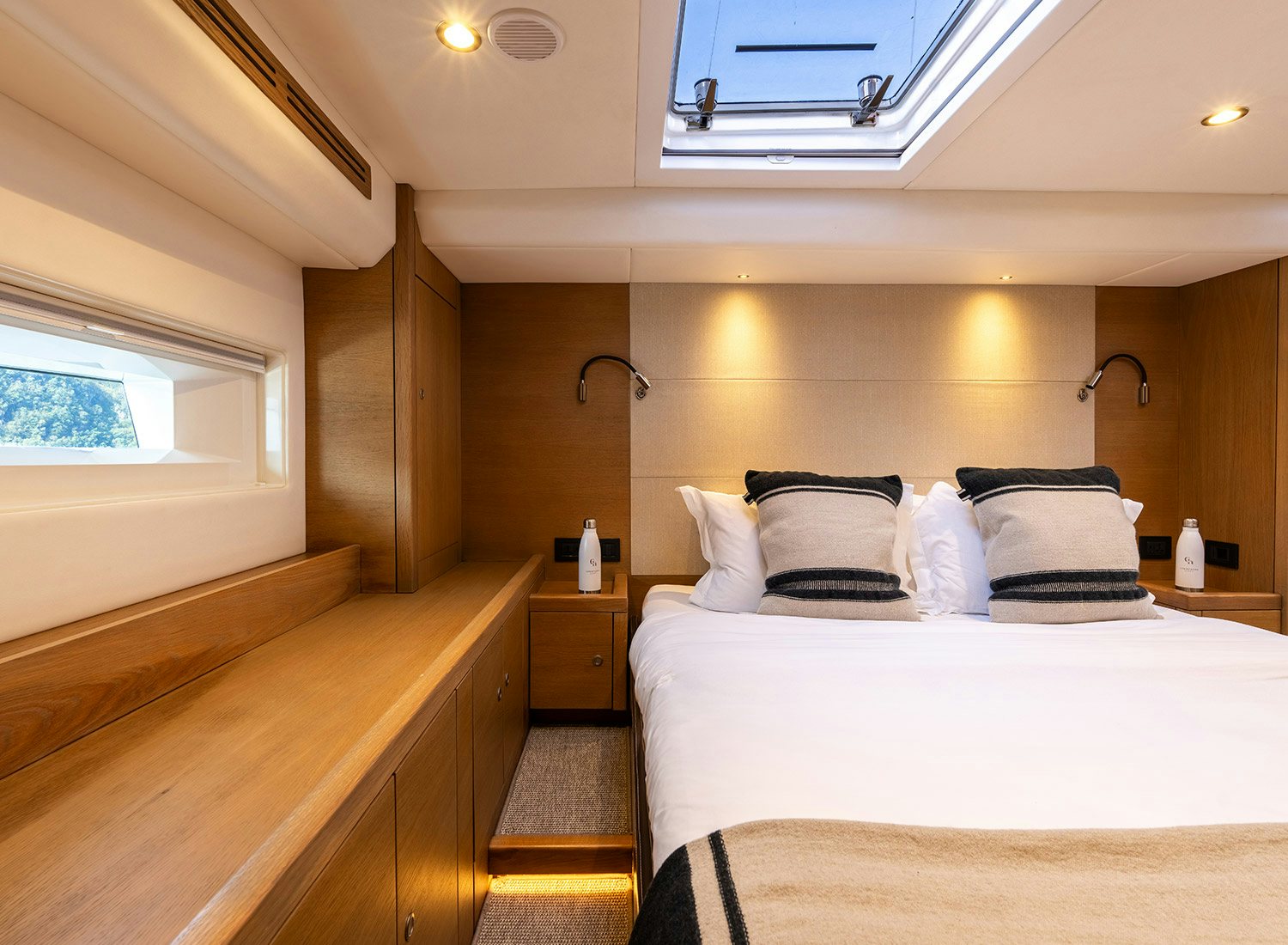 a room with two beds aboard CHAMPAGNE HIPPY Yacht for Sale