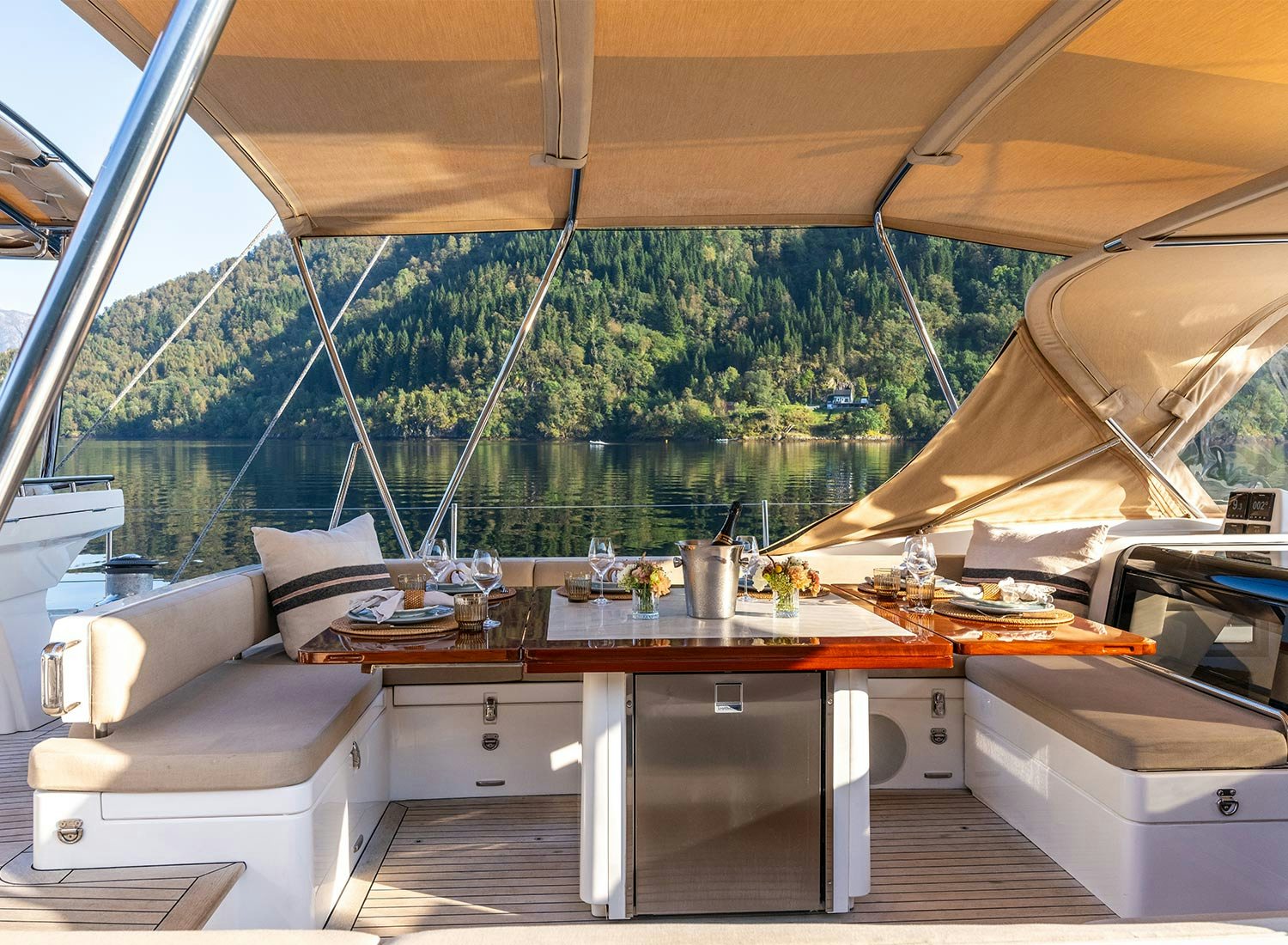 a room with a table and chairs aboard CHAMPAGNE HIPPY Yacht for Sale