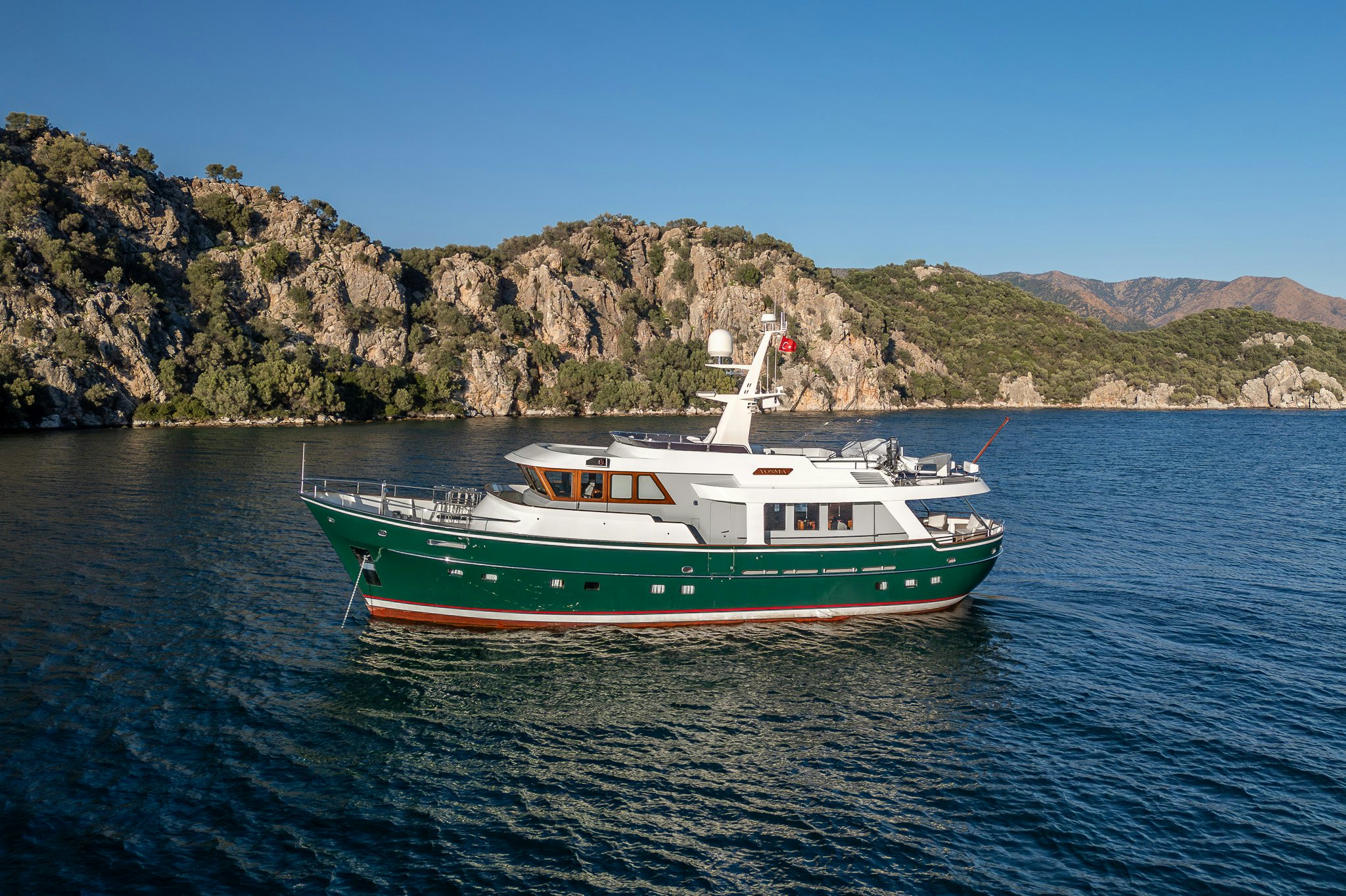 a boat in the water aboard YOSMA Yacht for Sale