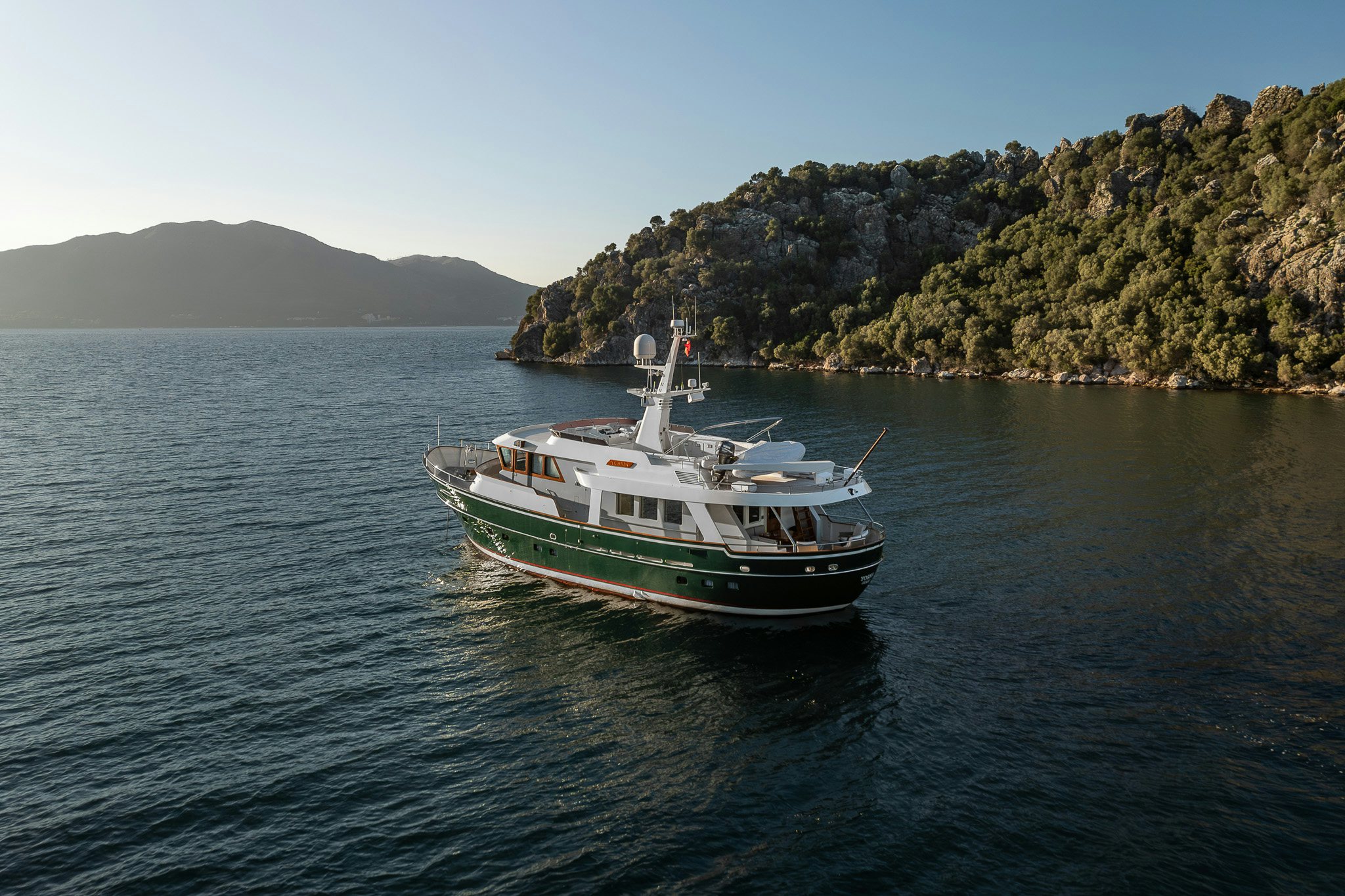 a boat on the water aboard YOSMA Yacht for Sale