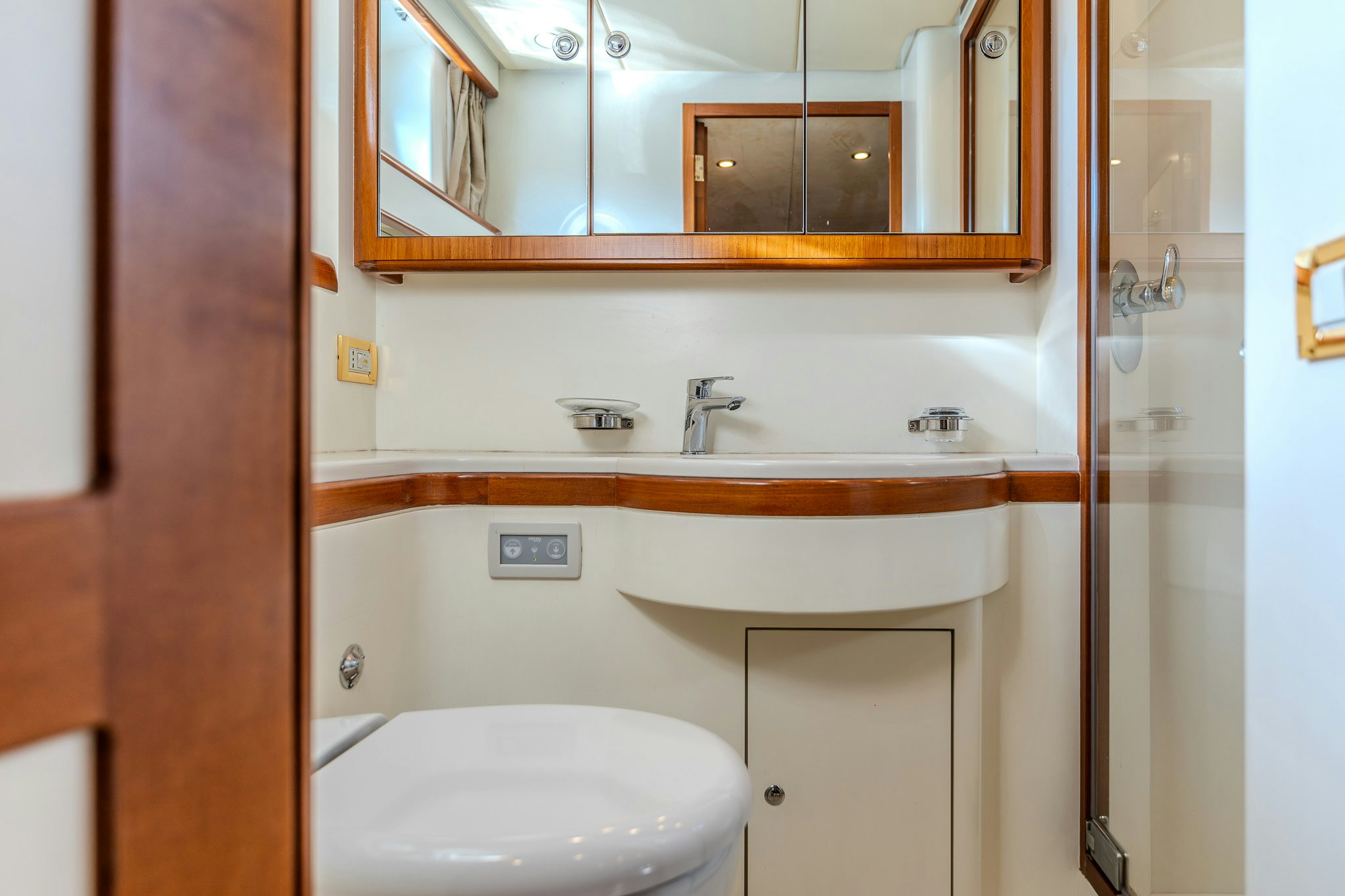 a bathroom with a toilet and a sink aboard YOSMA Yacht for Sale