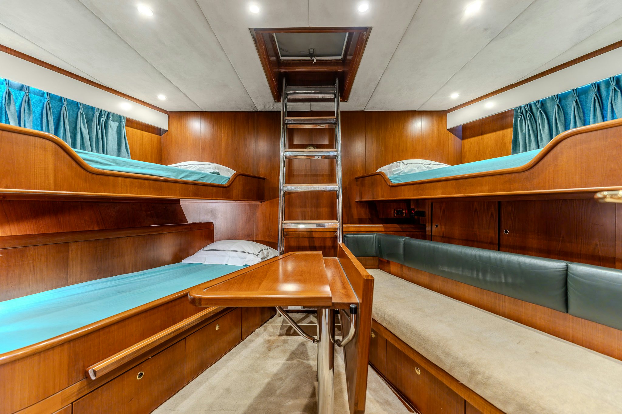 bunk beds in a room aboard YOSMA Yacht for Sale