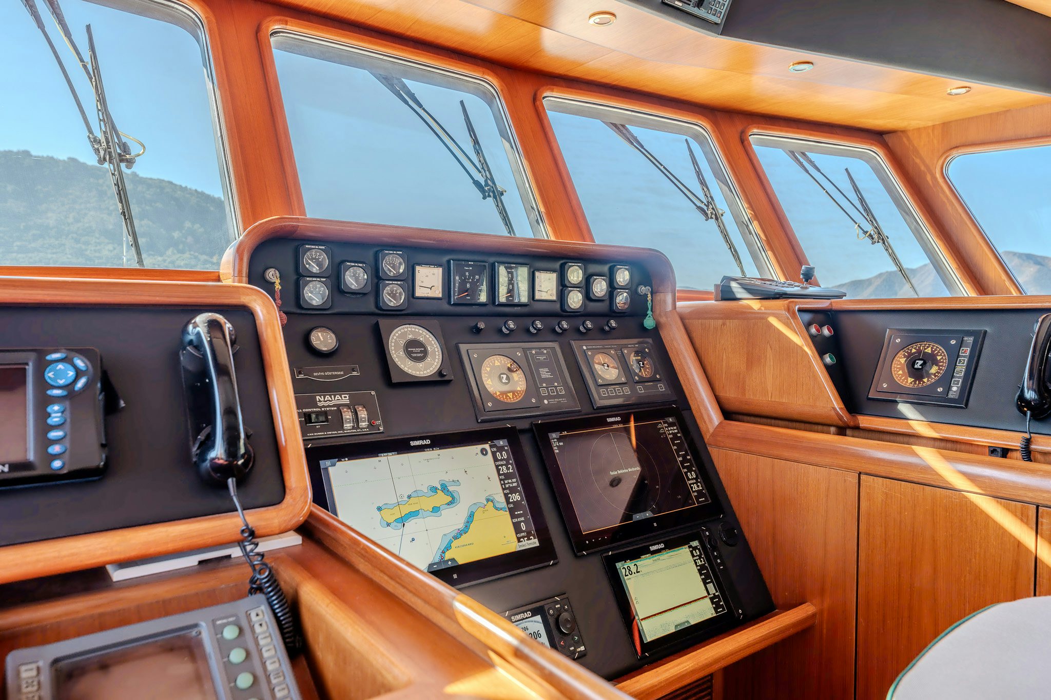 inside of a car aboard YOSMA Yacht for Sale