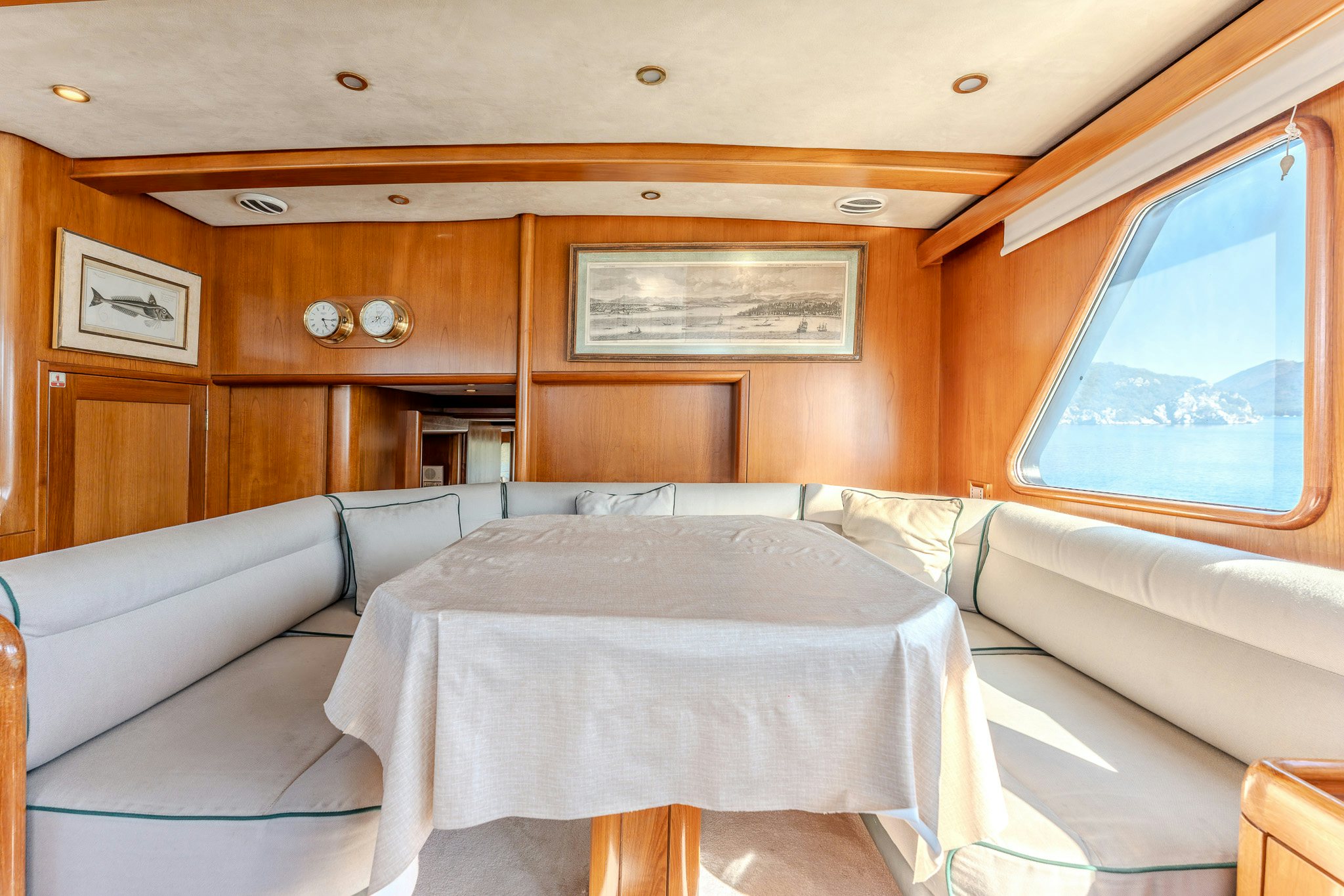 a room with a bed and a window aboard YOSMA Yacht for Sale