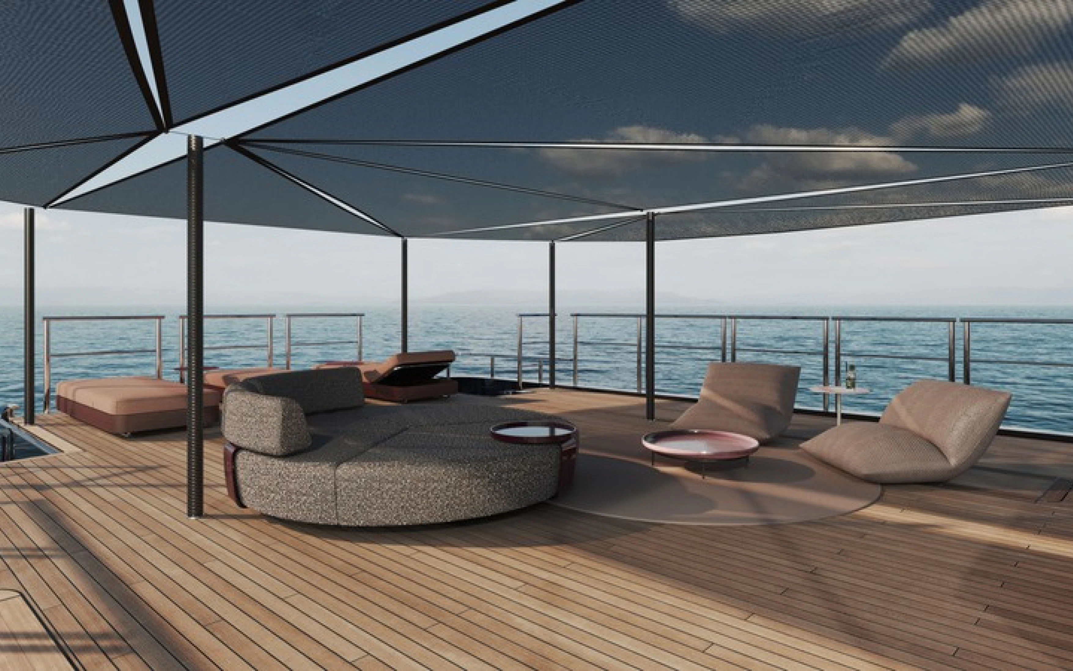 a deck with a view of the ocean aboard CASA F Yacht for Charter
