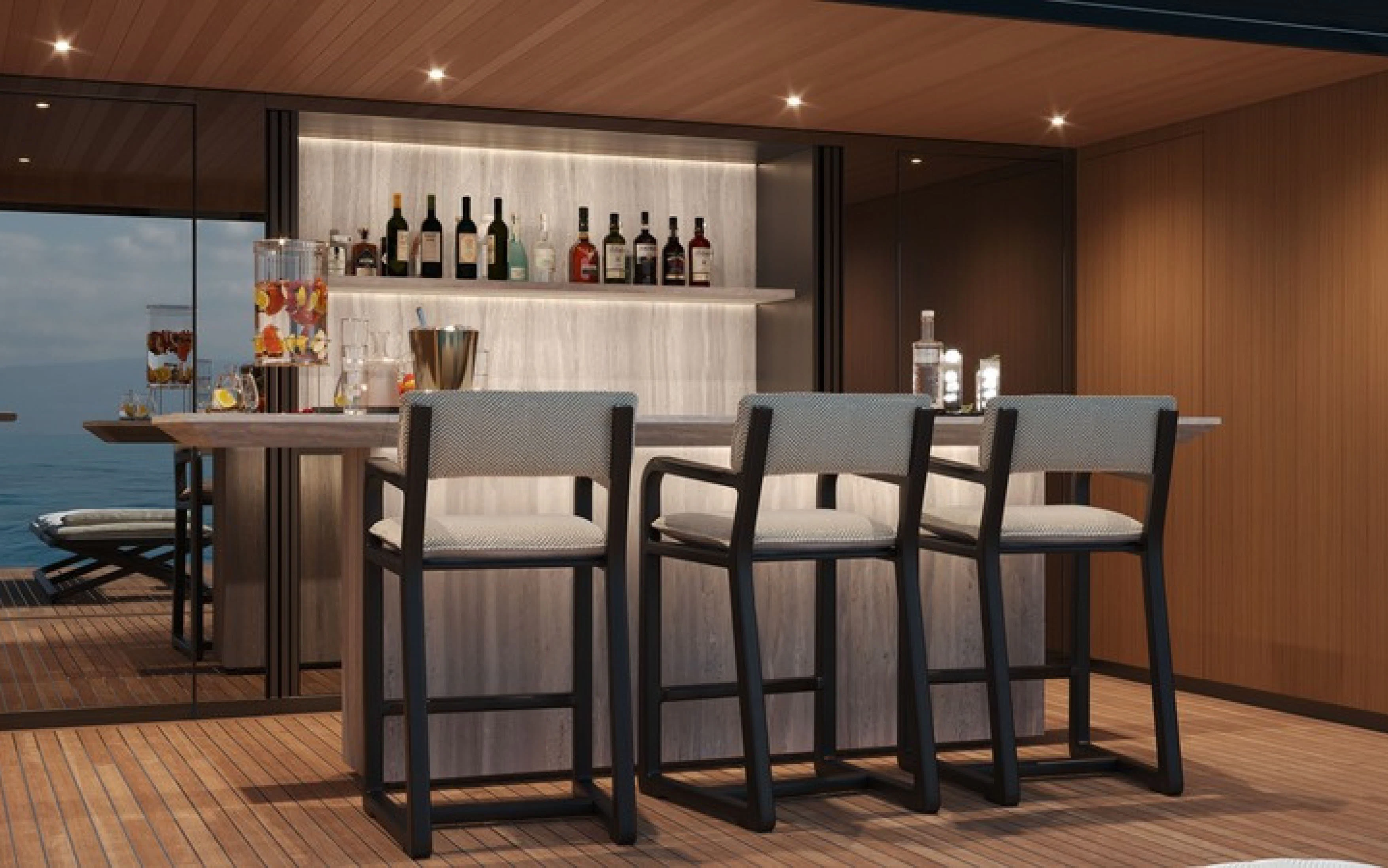 a table and chairs in a room aboard CASA F Yacht for Charter