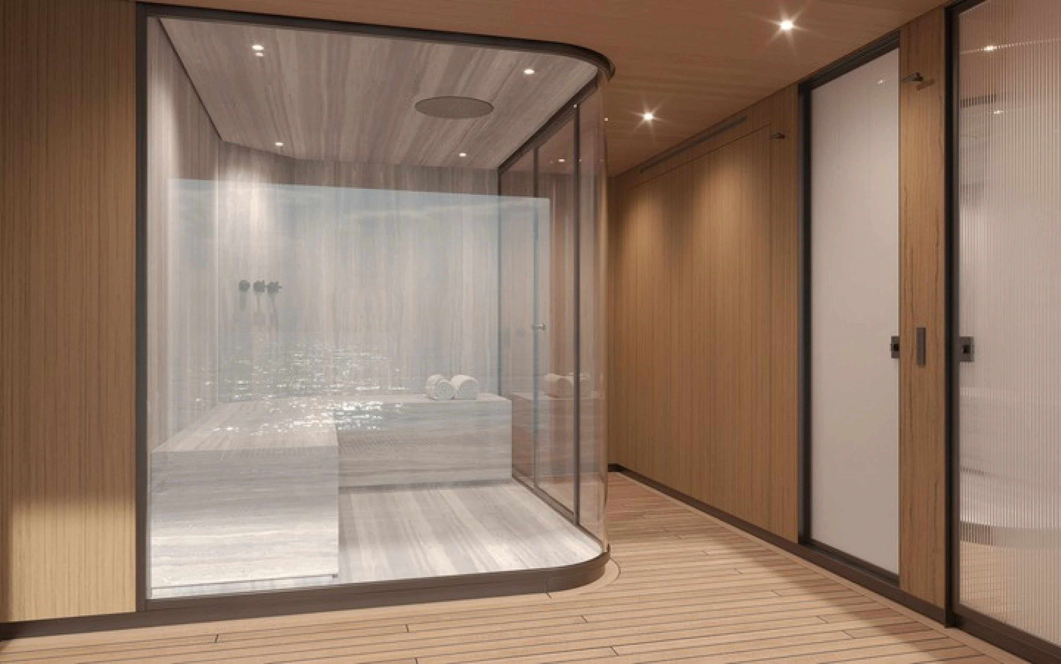 a room with a large glass shower aboard CASA F Yacht for Charter