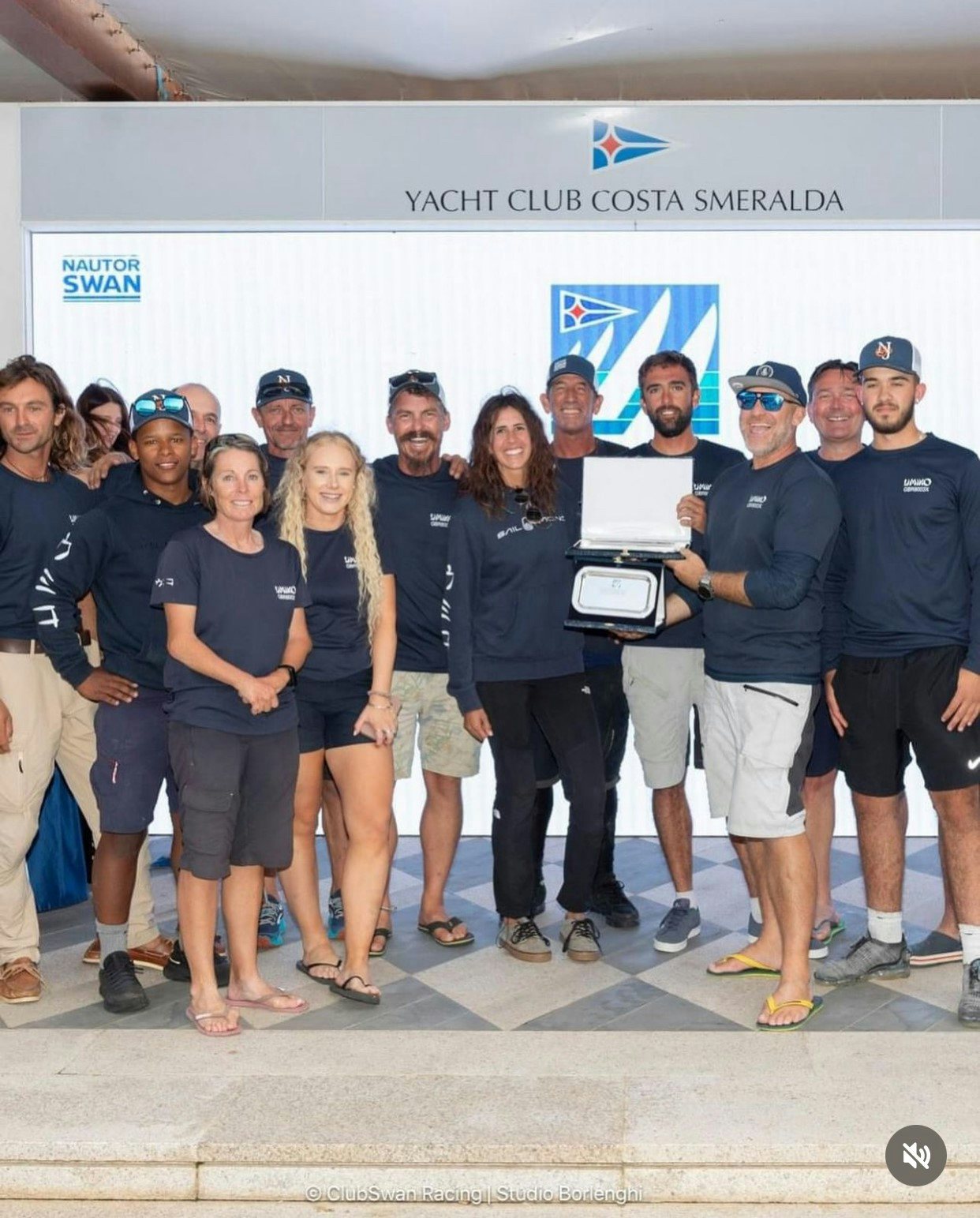 Helena Lucas et al. posing for a photo aboard UMIKO Yacht for Sale