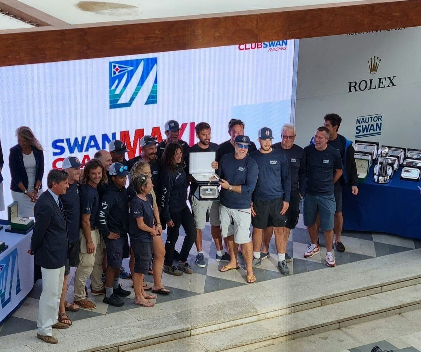 a group of people posing for a photo aboard UMIKO Yacht for Sale