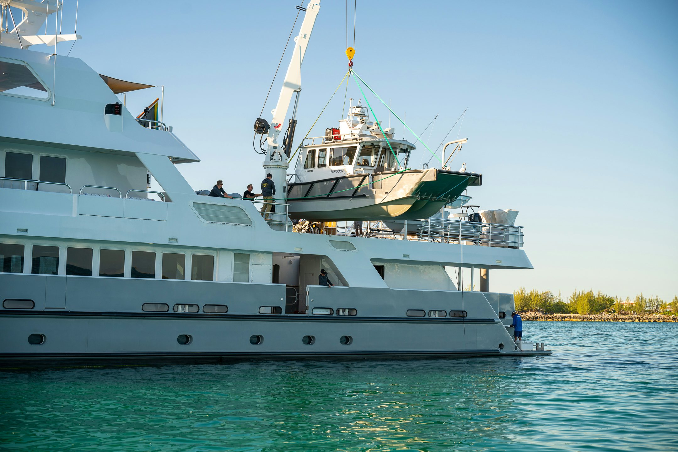 a large white boat in the water aboard COMPASS ROSE Yacht for Sale