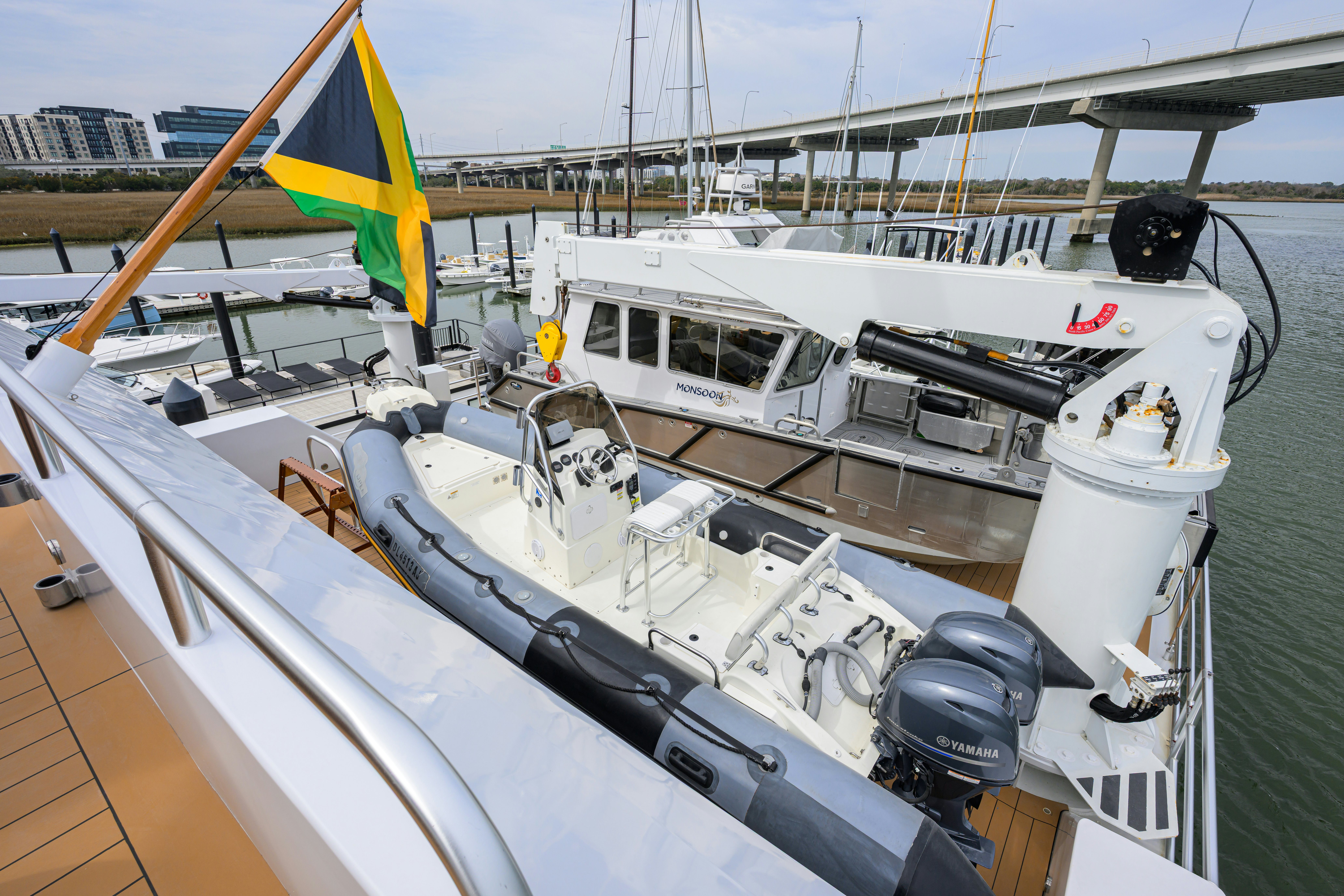 a boat docked at a port aboard COMPASS ROSE Yacht for Sale