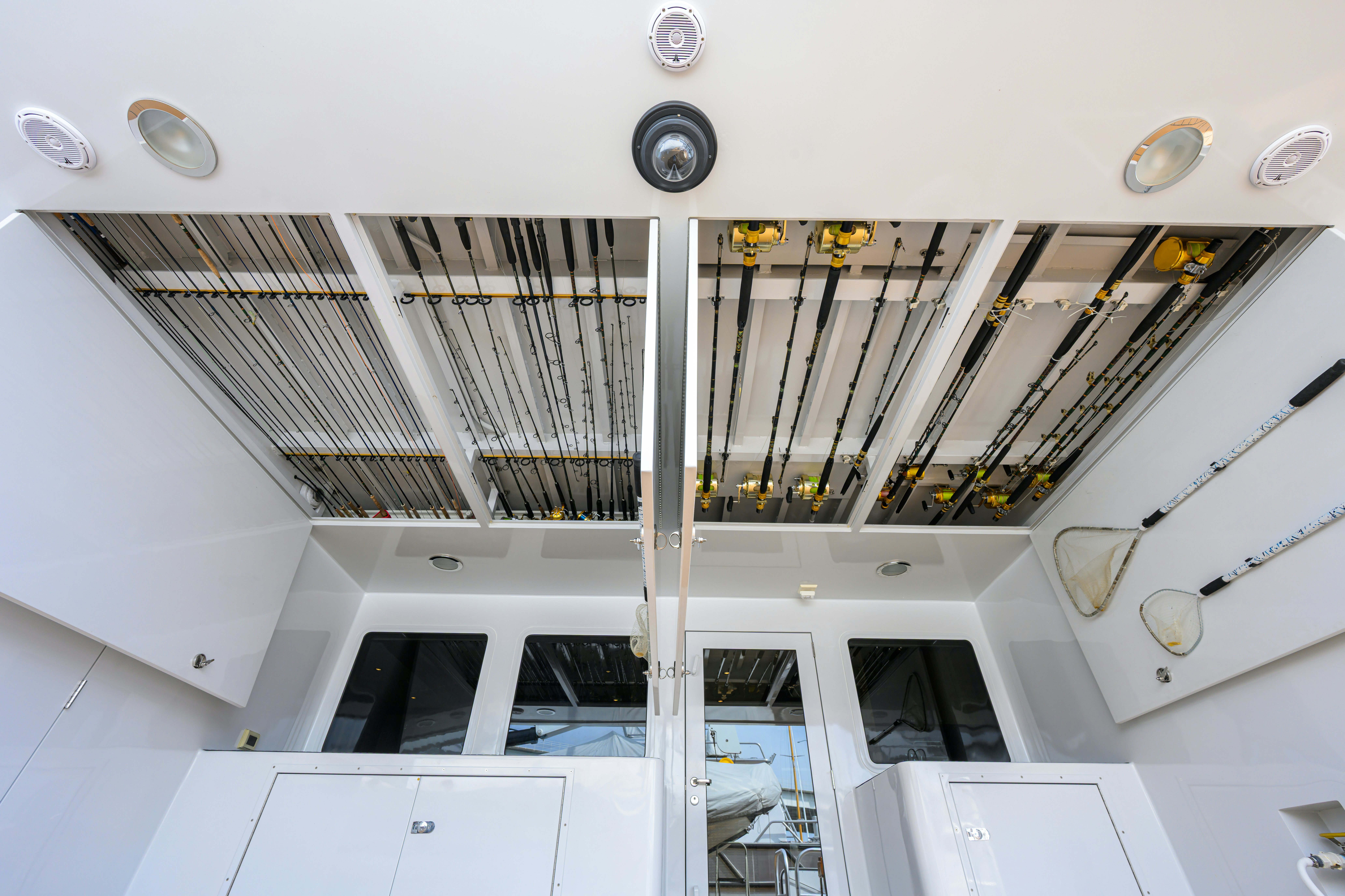 a white building with a metal frame aboard COMPASS ROSE Yacht for Sale