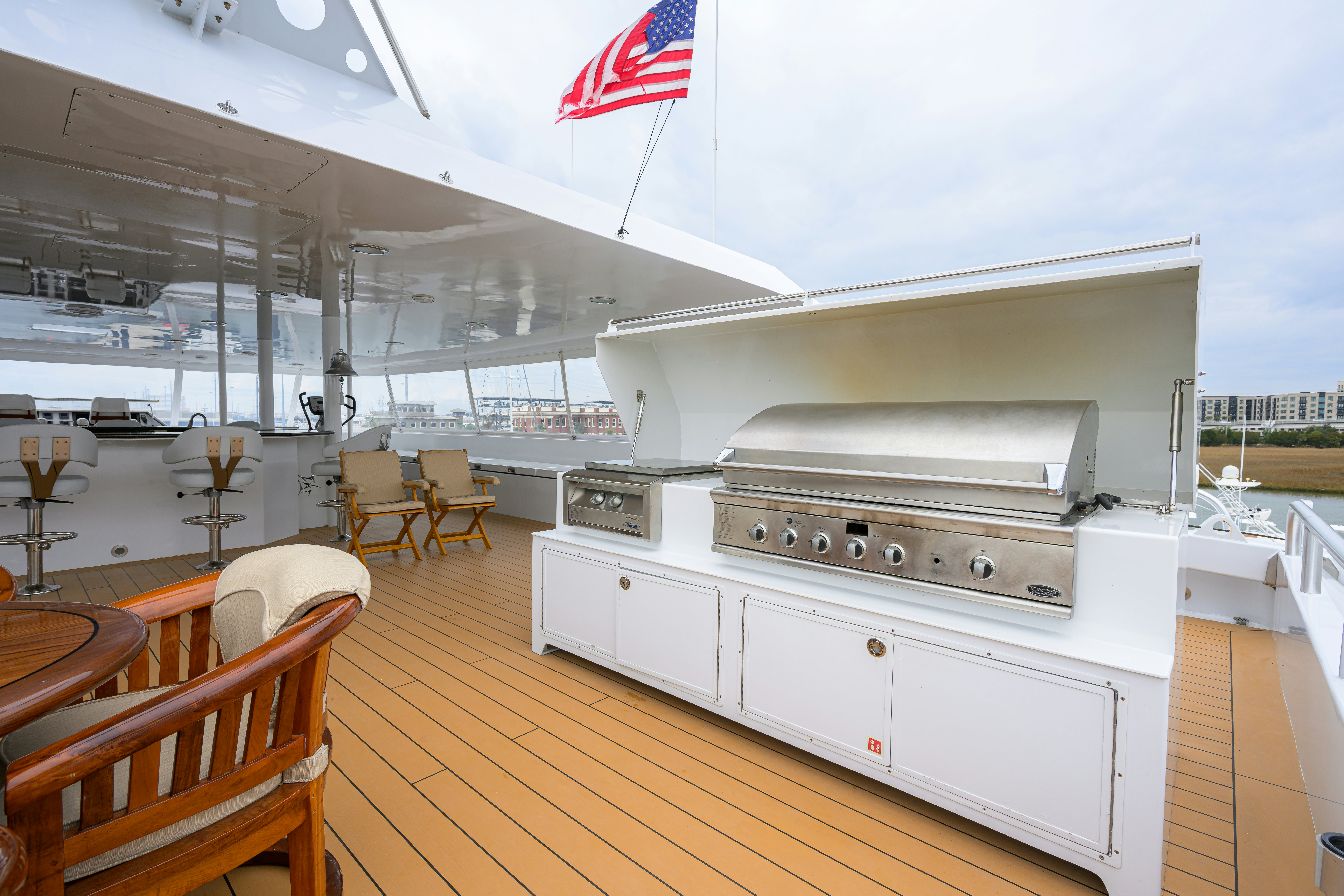 a large kitchen with a large stove aboard COMPASS ROSE Yacht for Sale