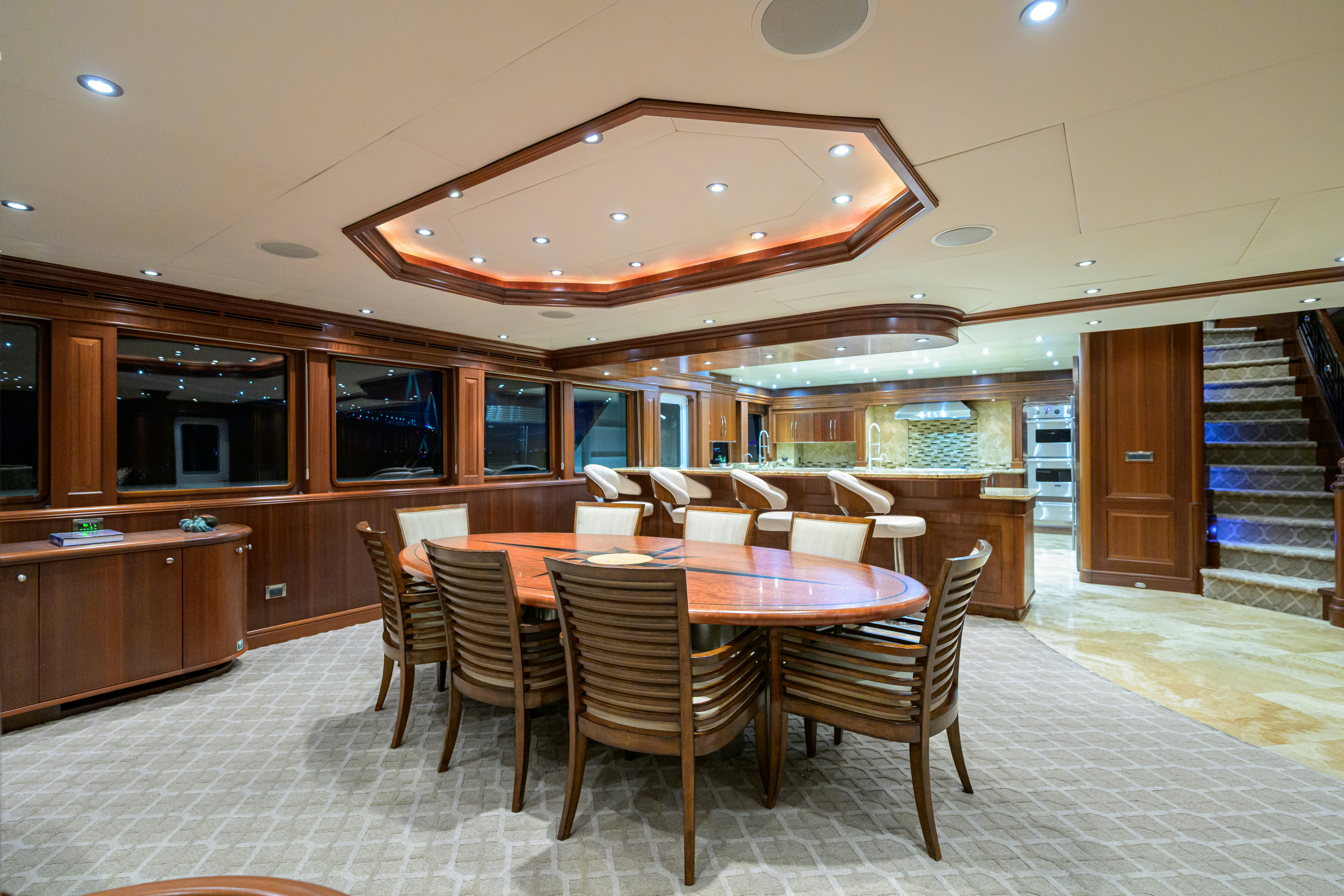 a large kitchen with wooden cabinets aboard COMPASS ROSE Yacht for Sale