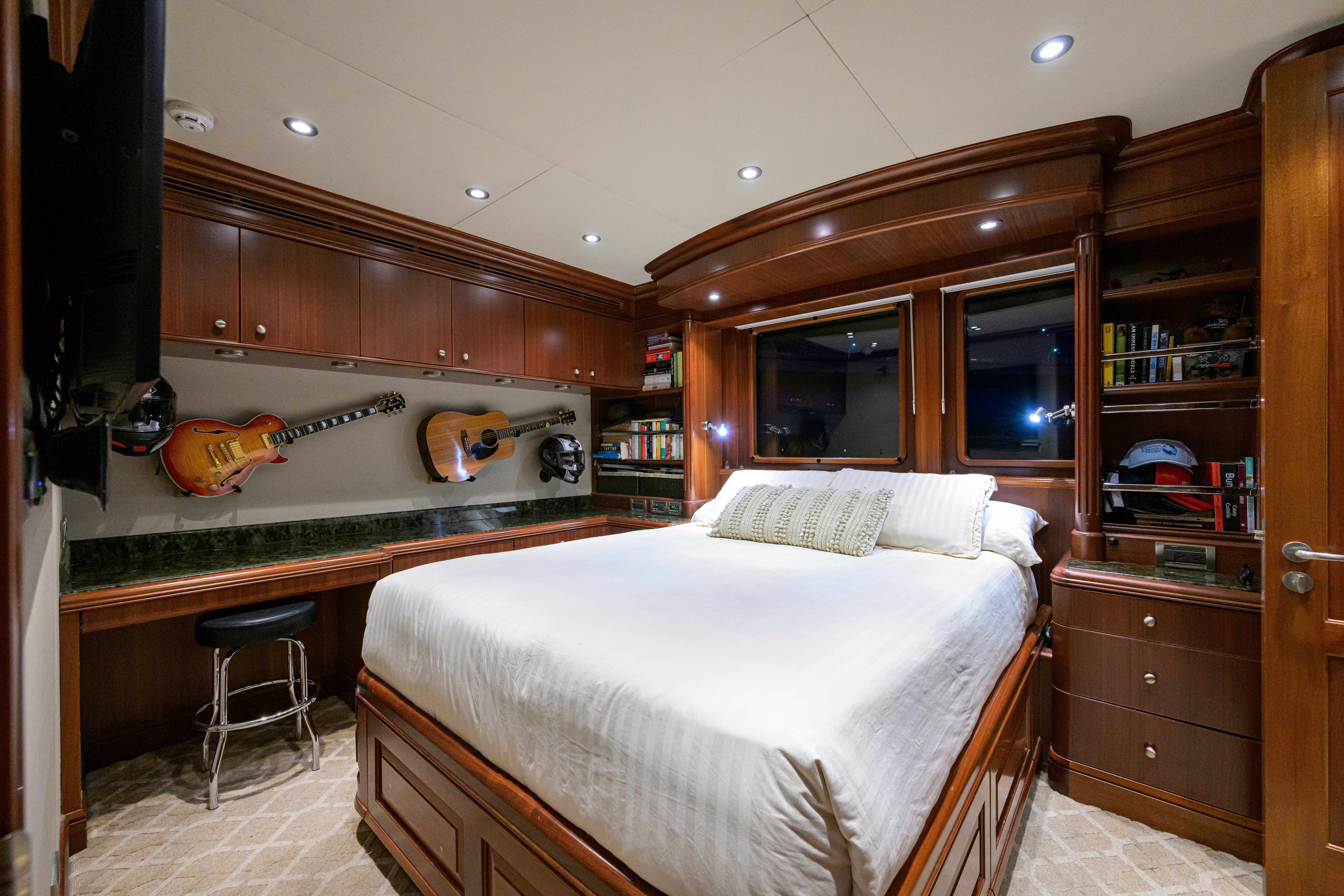 a bedroom with a bunk bed aboard COMPASS ROSE Yacht for Sale