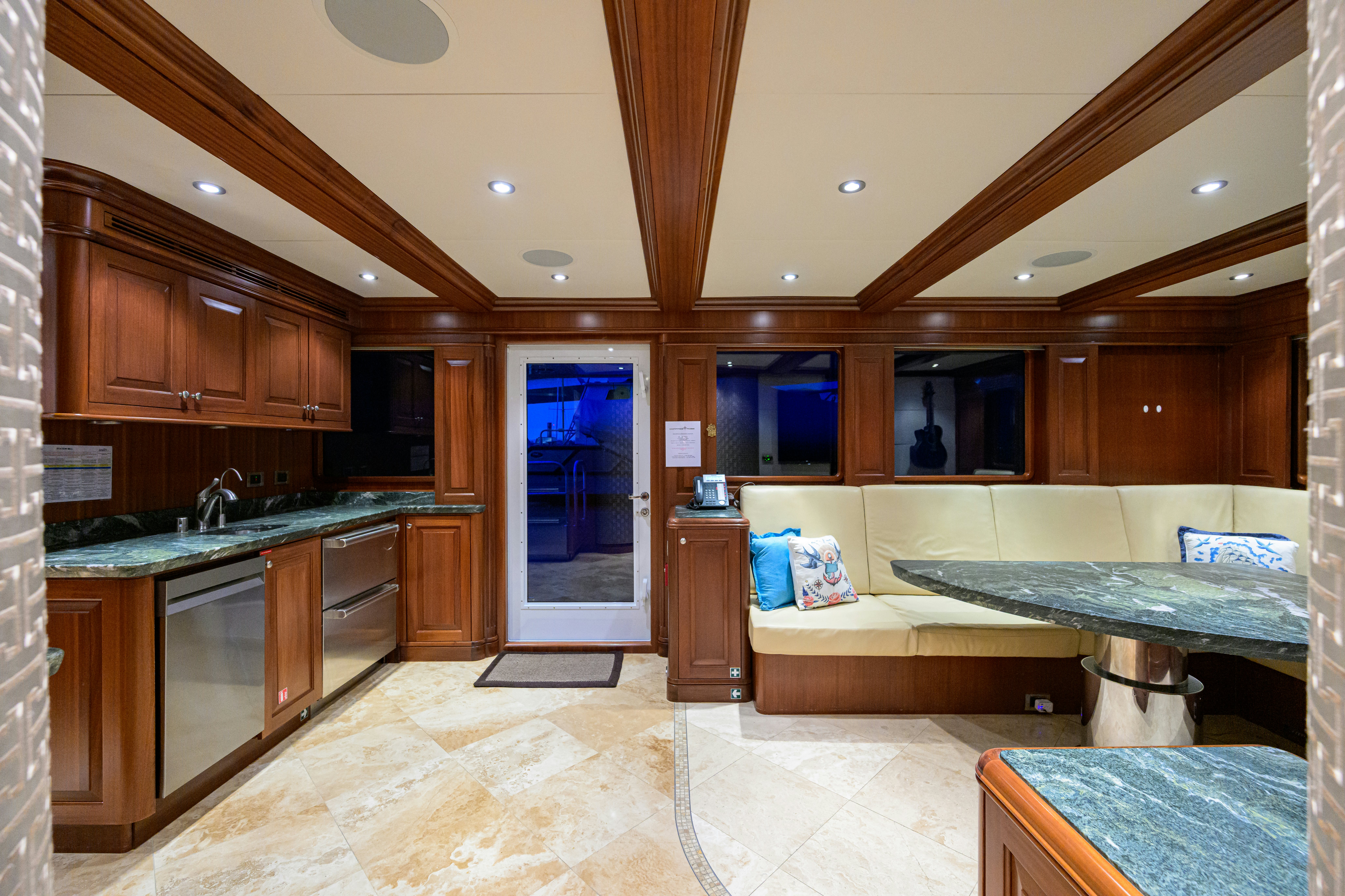 a large kitchen with a large open floor plan aboard COMPASS ROSE Yacht for Sale