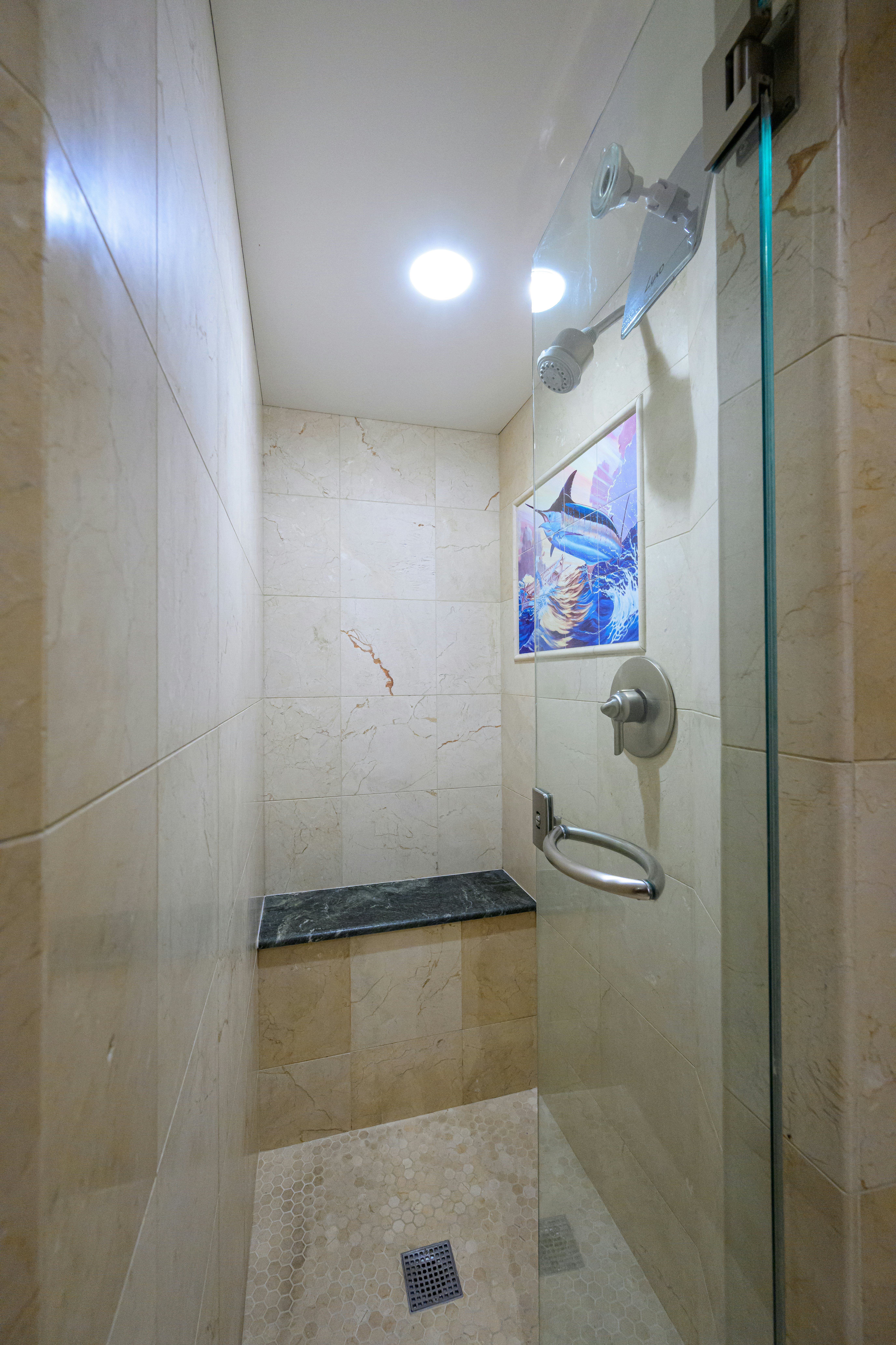 a bathroom with a shower and a sink aboard COMPASS ROSE Yacht for Sale