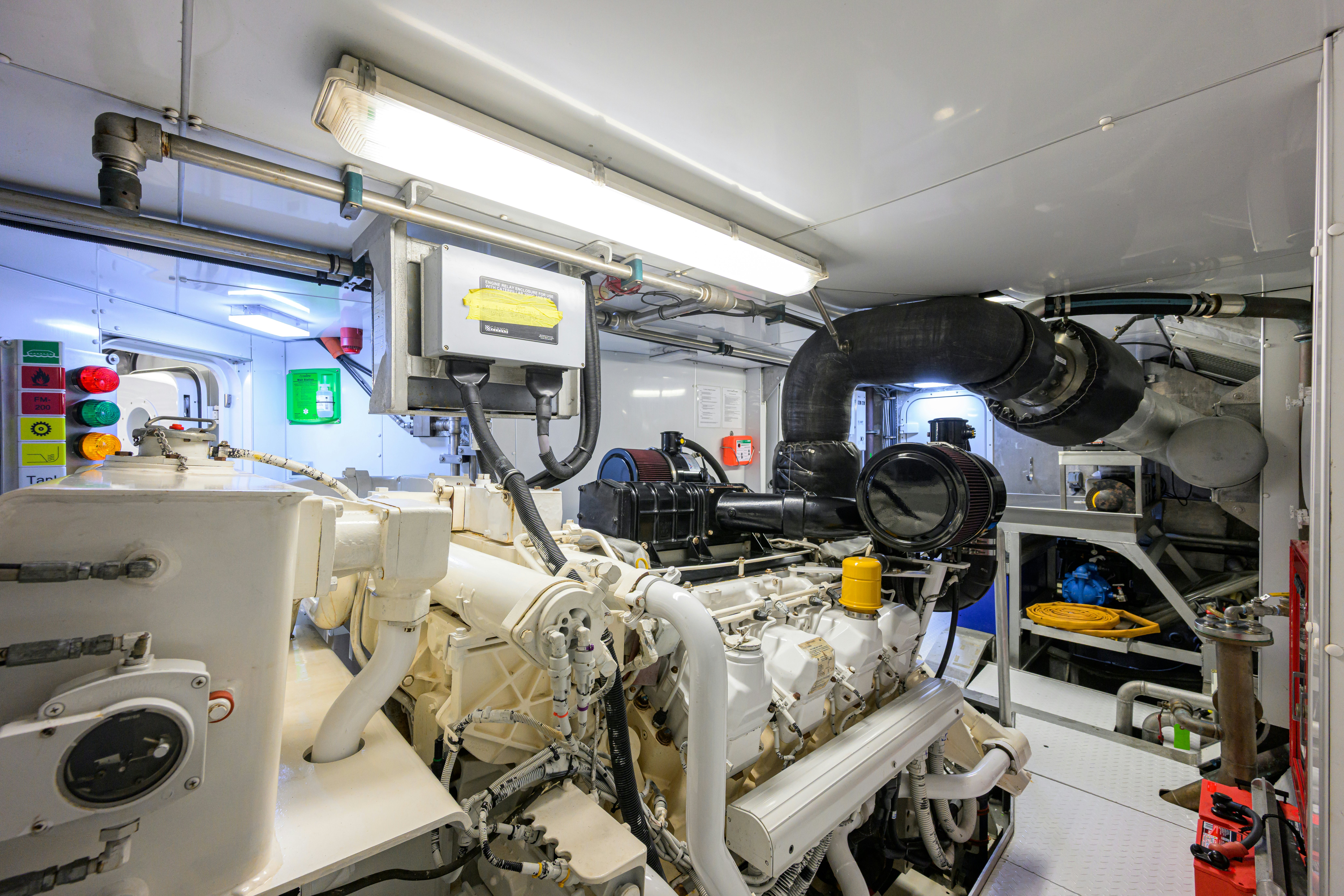 a large white machine with many wires aboard COMPASS ROSE Yacht for Sale