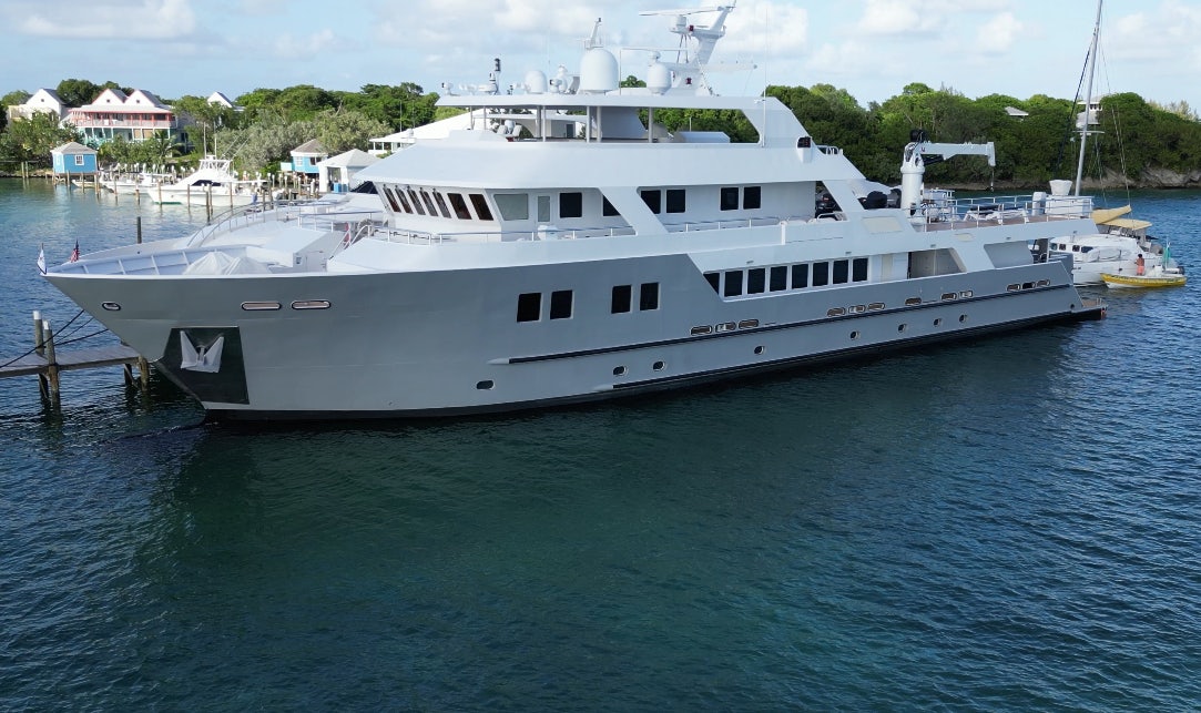 a large white boat aboard COMPASS ROSE Yacht for Sale