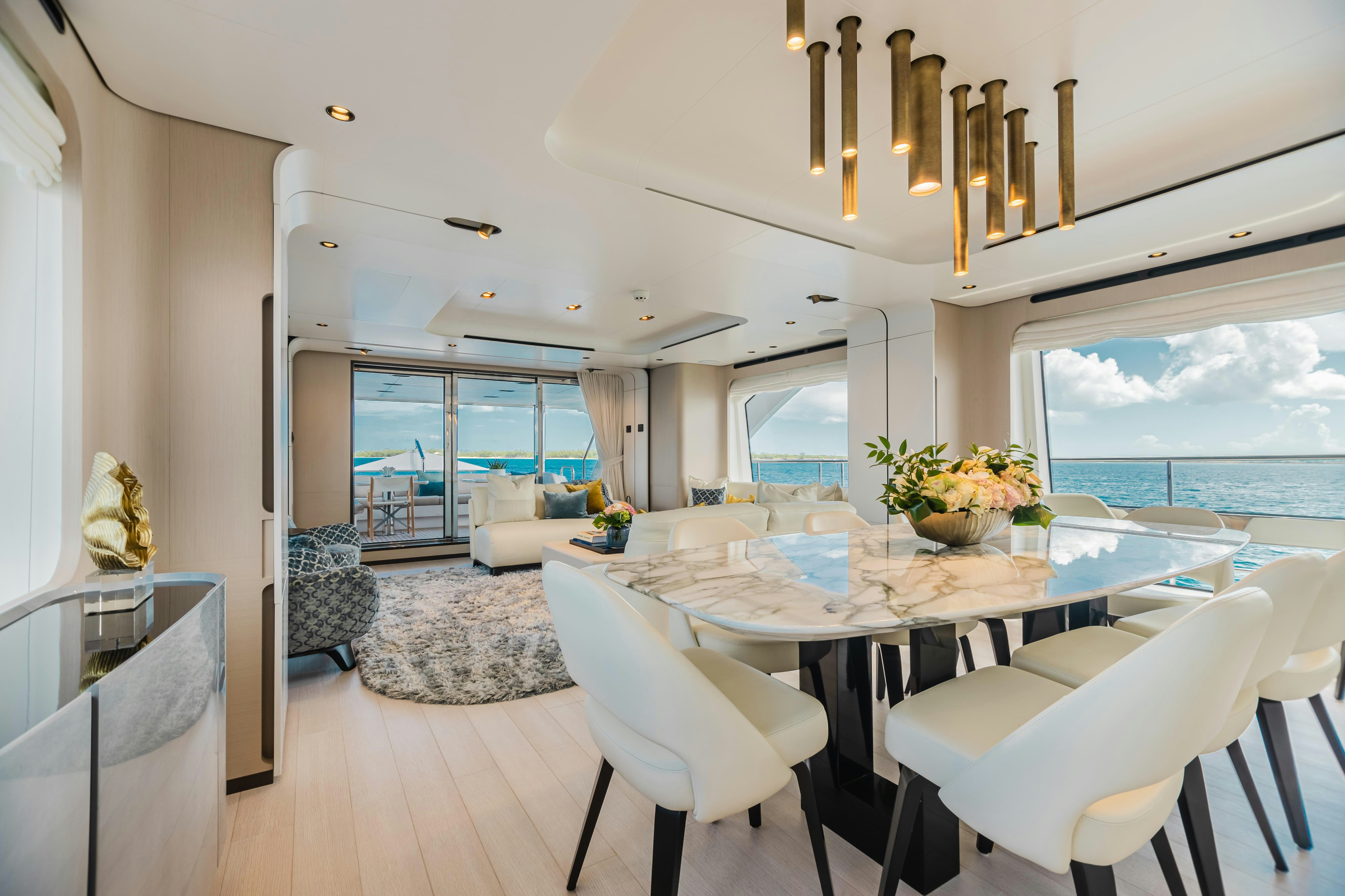 a large dining room with a large open floor plan aboard MAREA LA NAUTICA Yacht for Charter