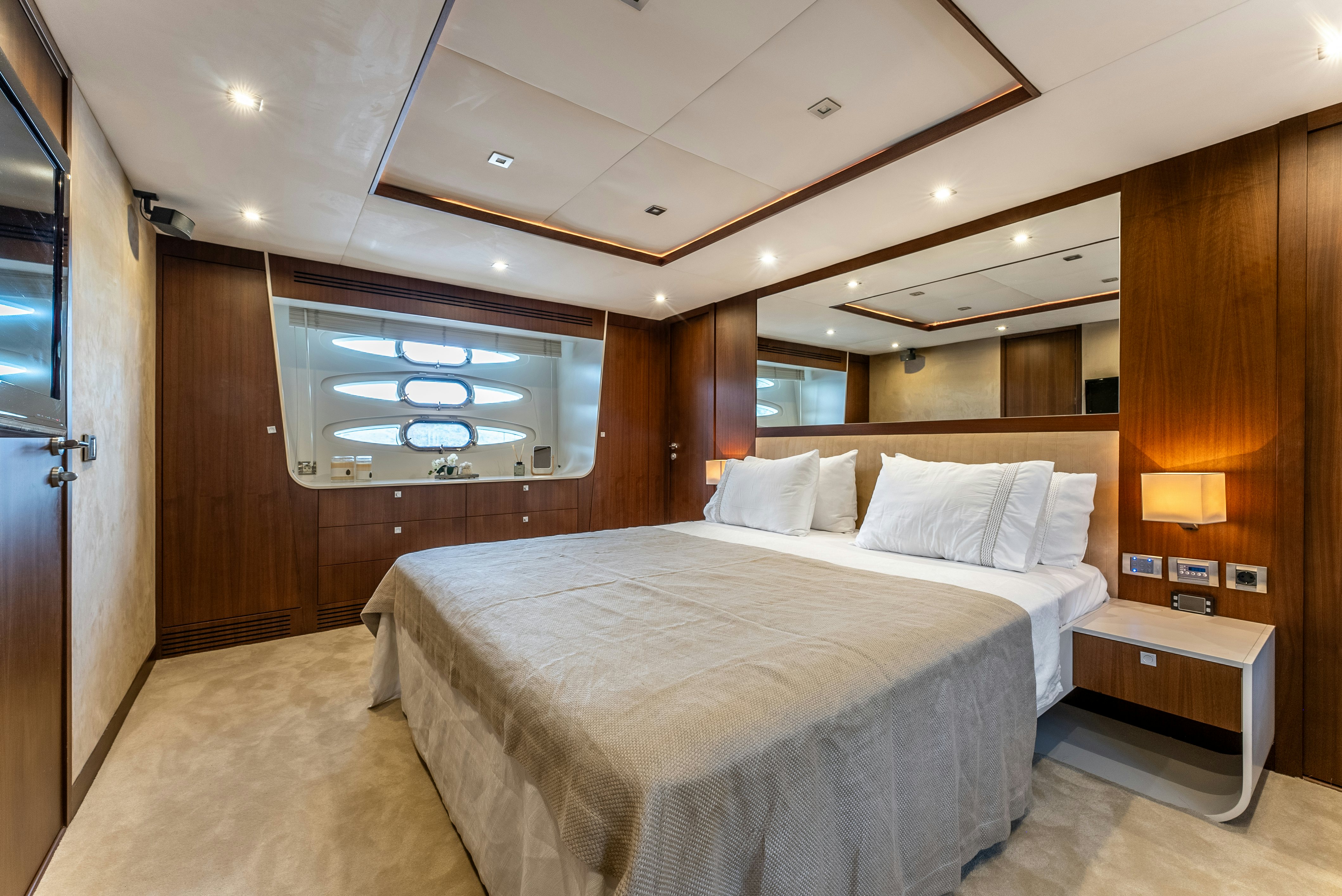 a bed in a room aboard LADY F Yacht for Sale