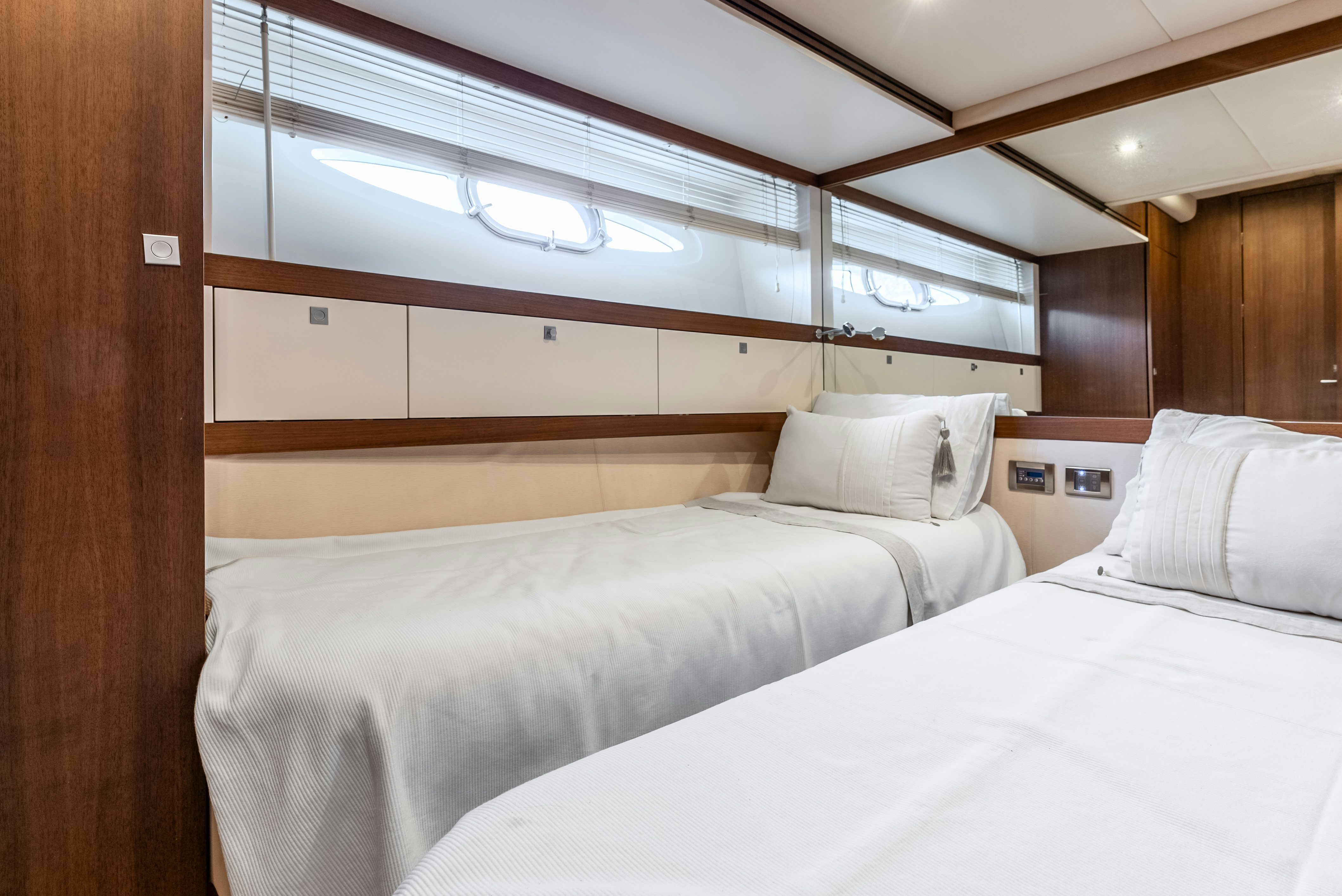 a room with two beds aboard LADY F Yacht for Sale