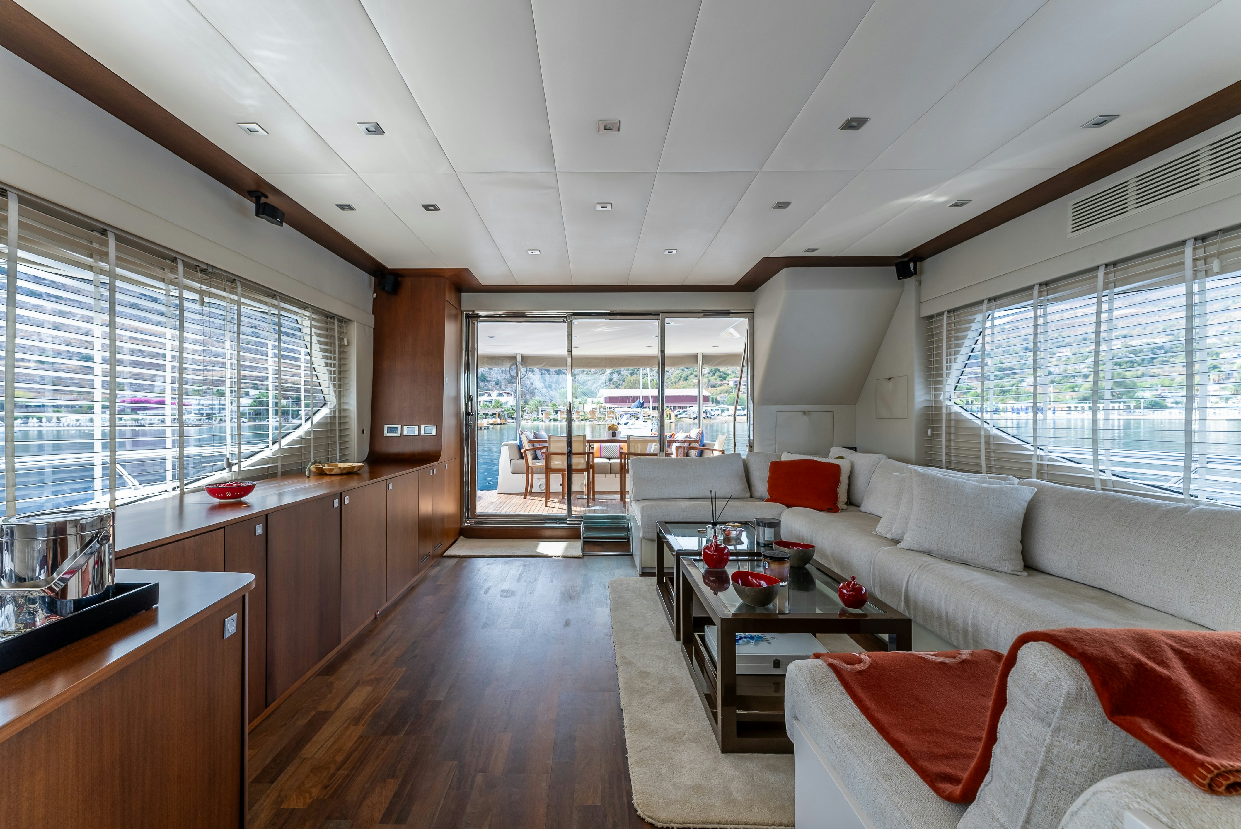 a living room with a large window aboard LADY F Yacht for Sale
