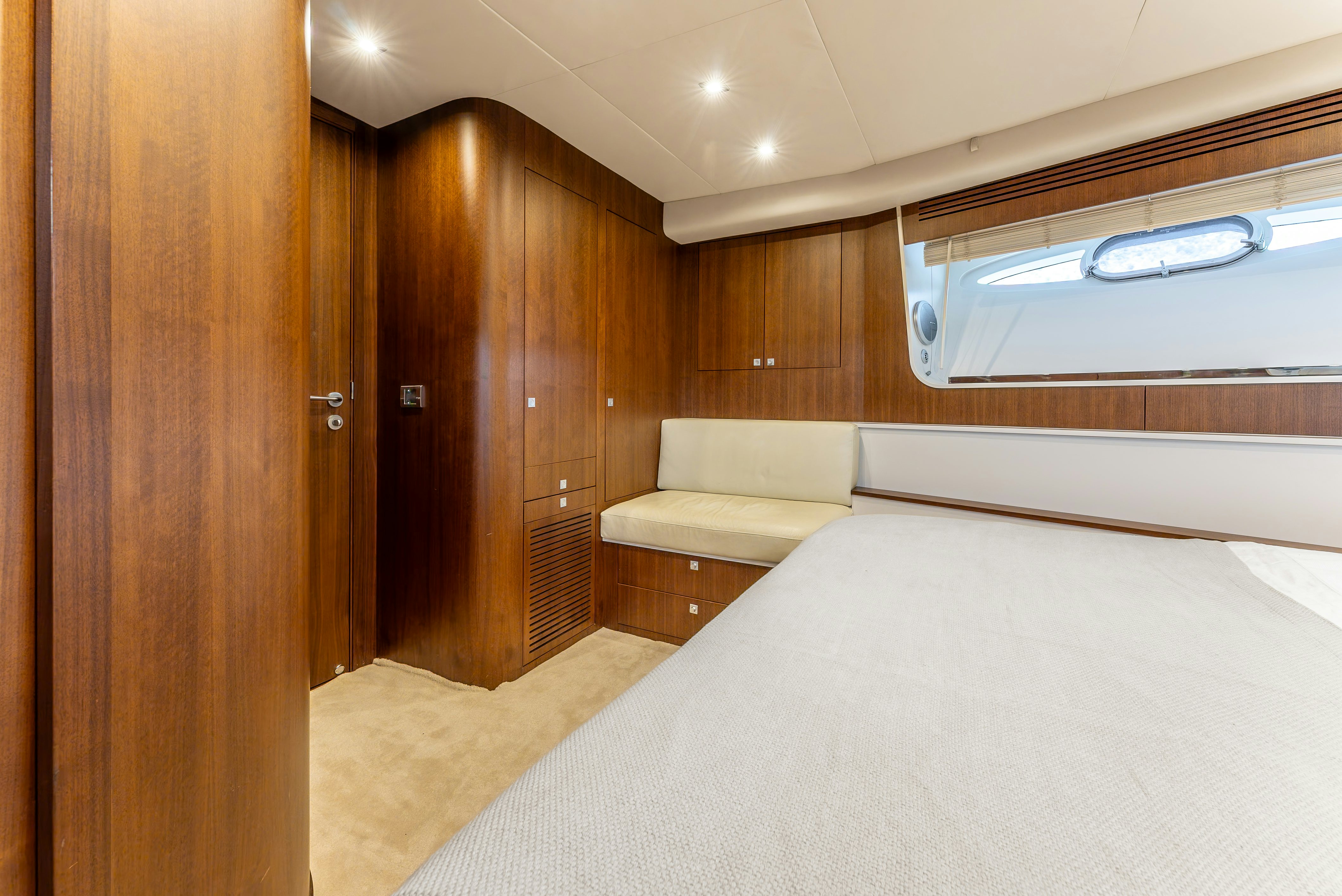 a bed in a room aboard LADY F Yacht for Sale