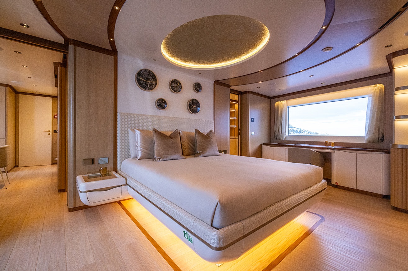 a bed in a room aboard ANJELIF Yacht for Charter