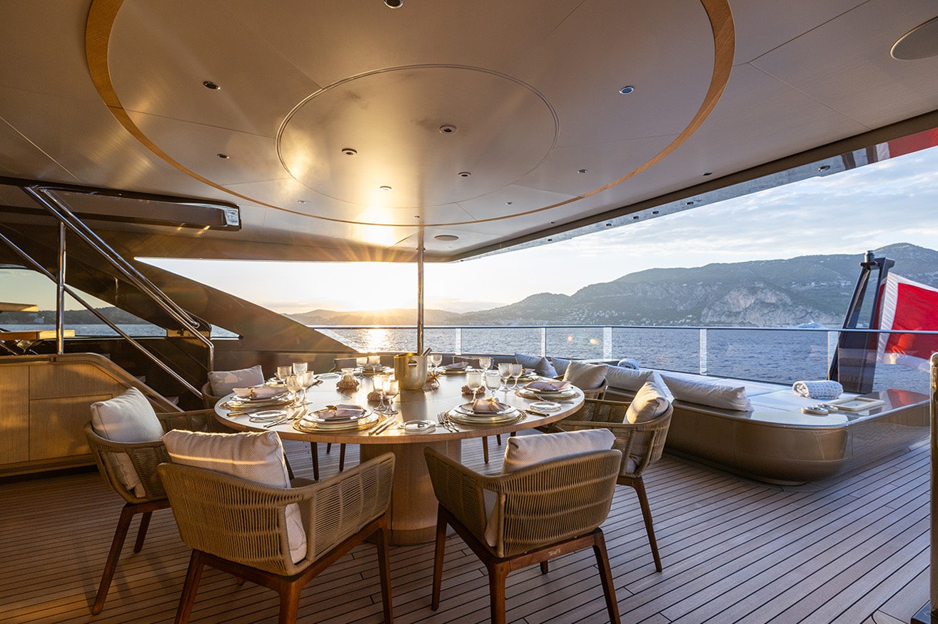 a table set for a meal aboard ANJELIF Yacht for Charter
