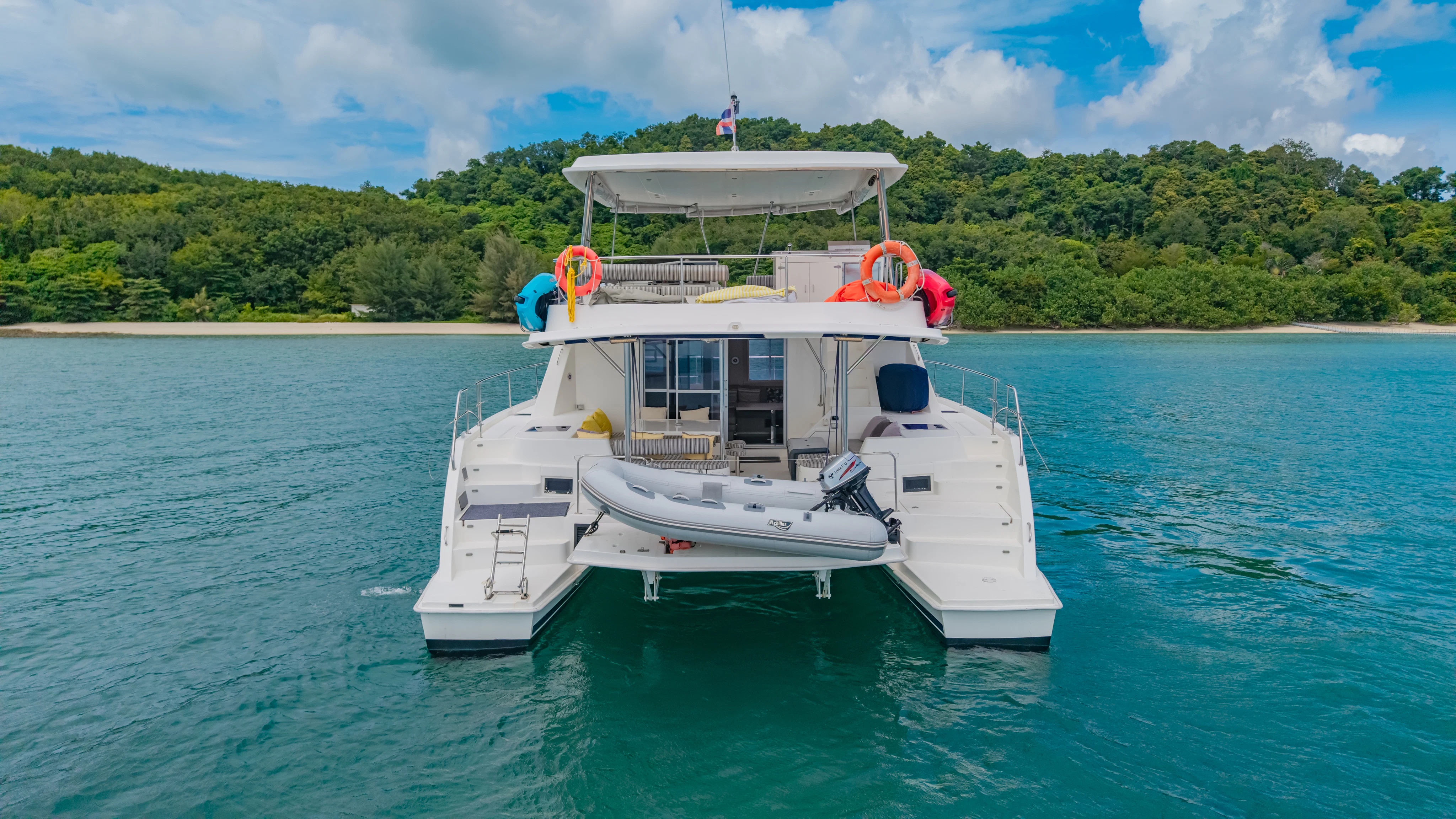 a boat in the water aboard HARMONY CAT Yacht for Sale