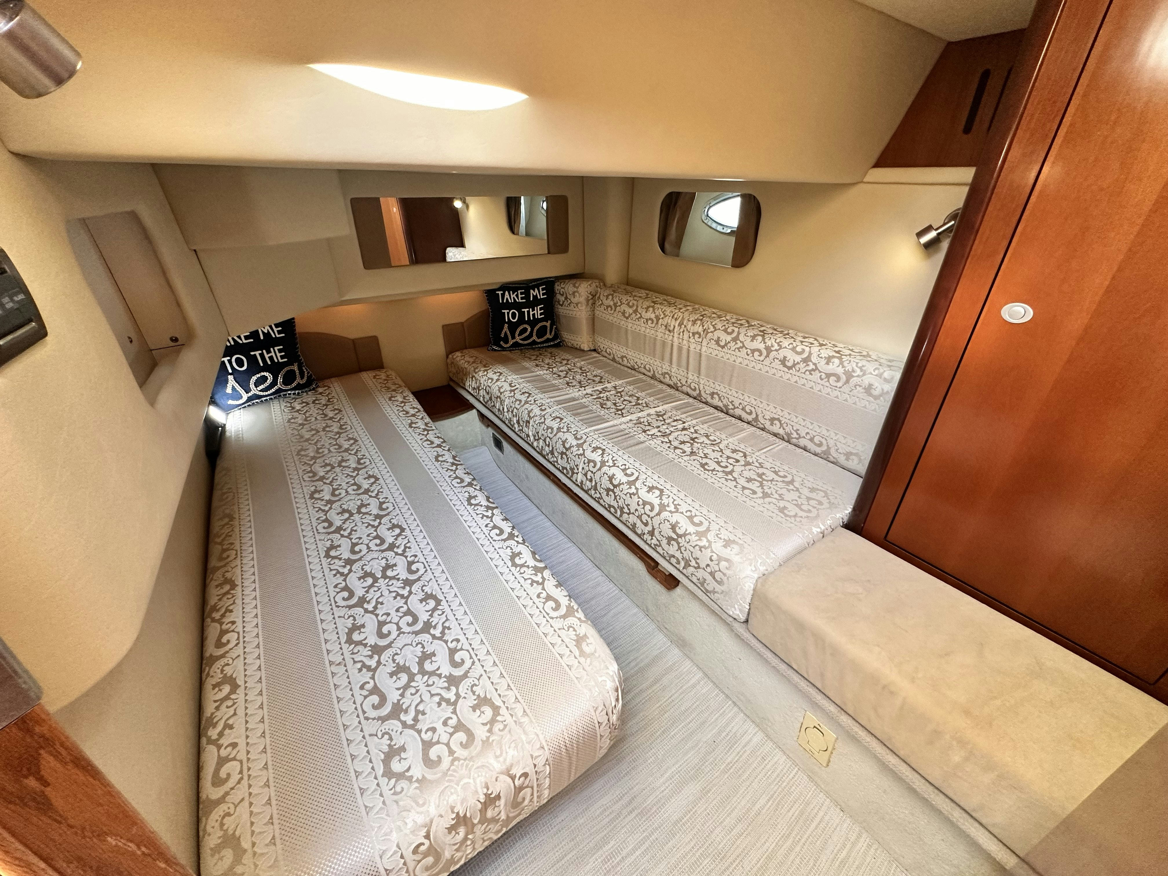 a room with bunk beds aboard LANAKILA Yacht for Sale