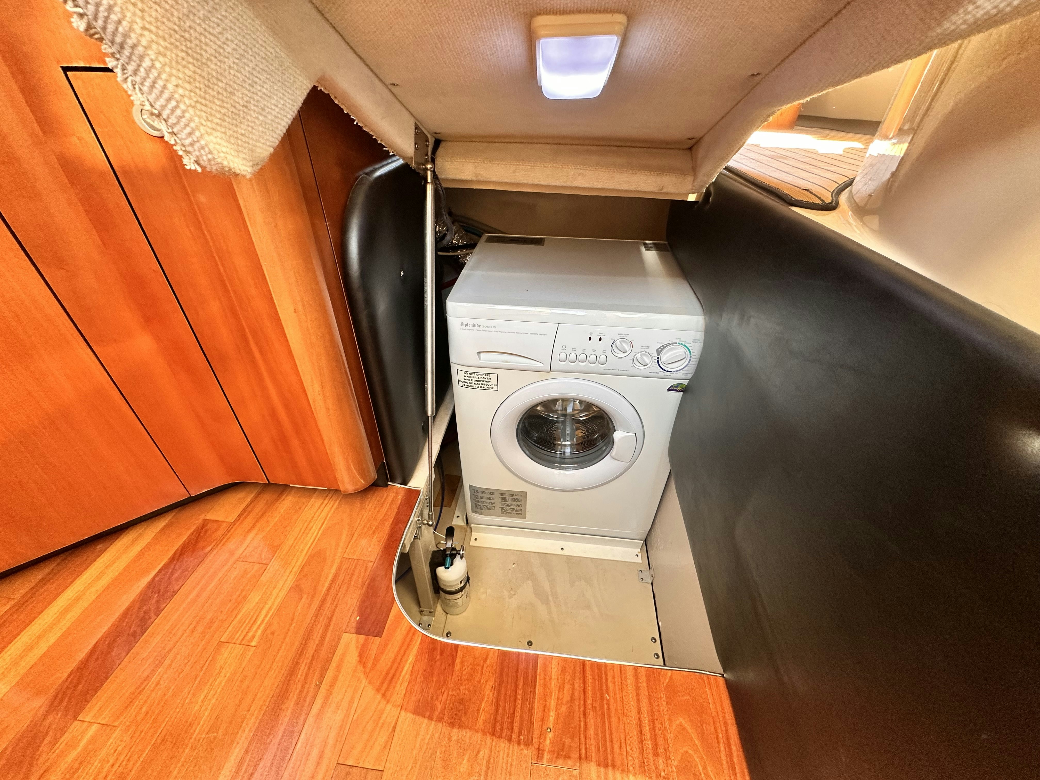 a white washing machine aboard LANAKILA Yacht for Sale