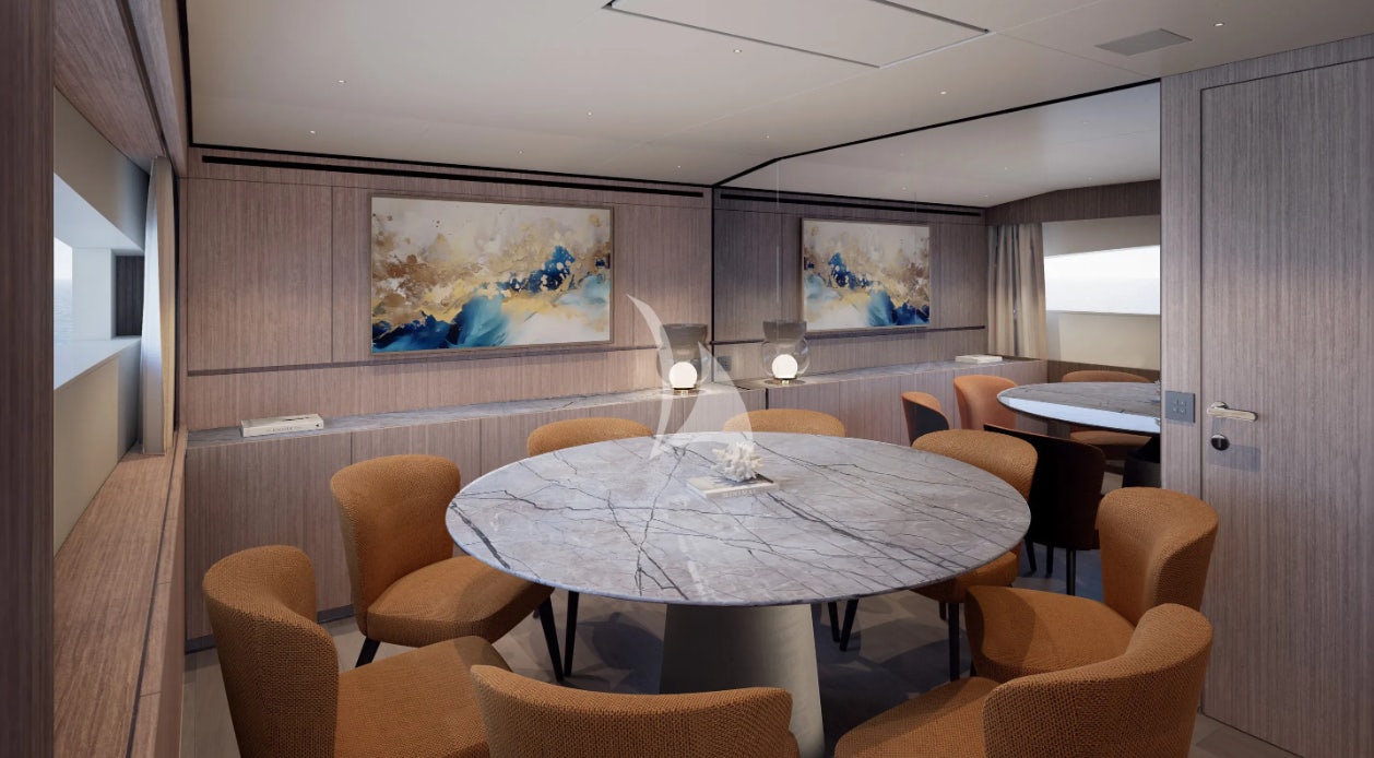 a room with a table and chairs aboard CATCH ME Yacht for Charter